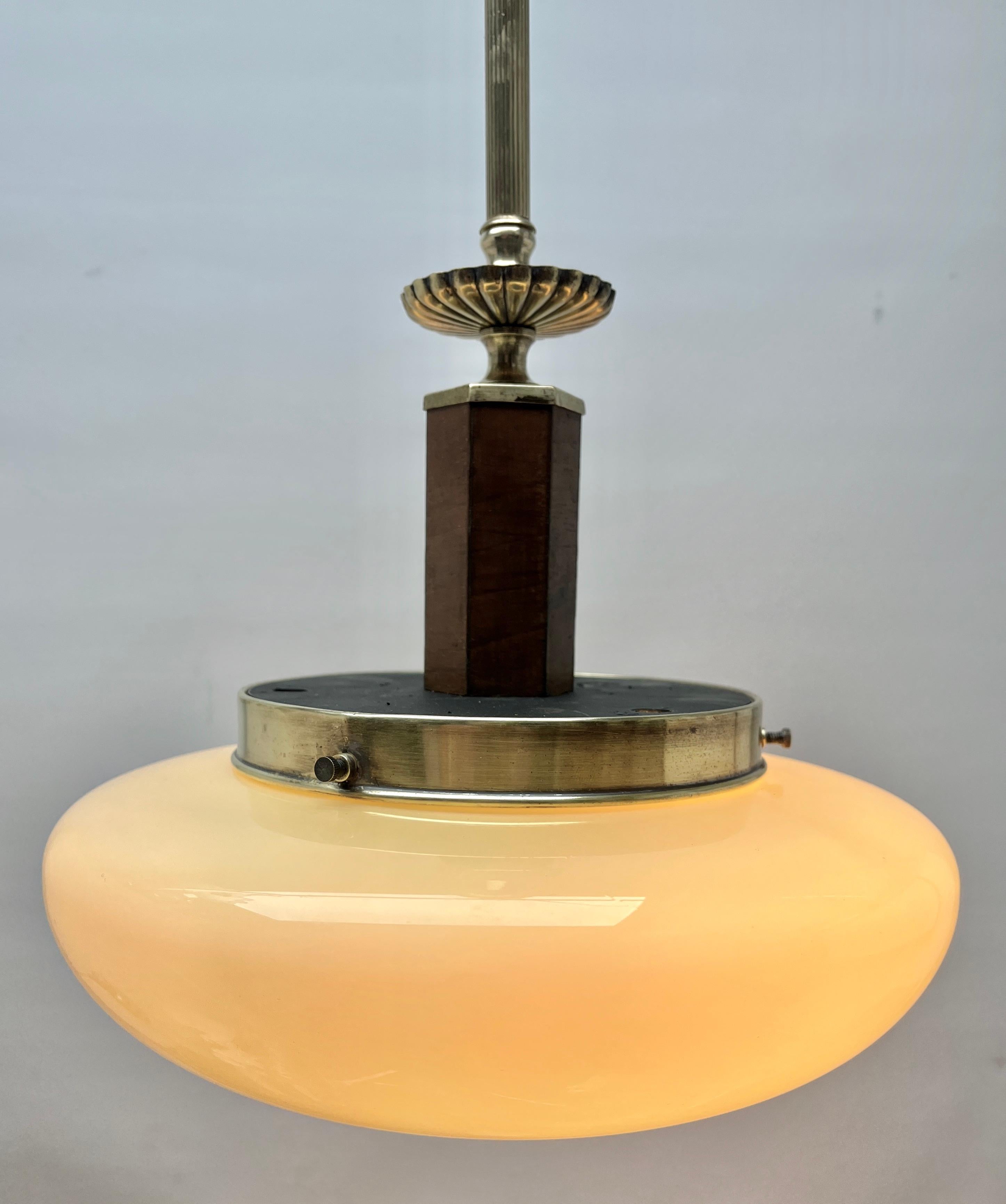 Art Deco ceiling lamp.
You can select from 2 different Globes see Picture

Photography fails to capture the simple elegant illumination provided by this lamp.

Fitting messing pendant ceiling light with screw fixing to hold a stylish Belgian Art