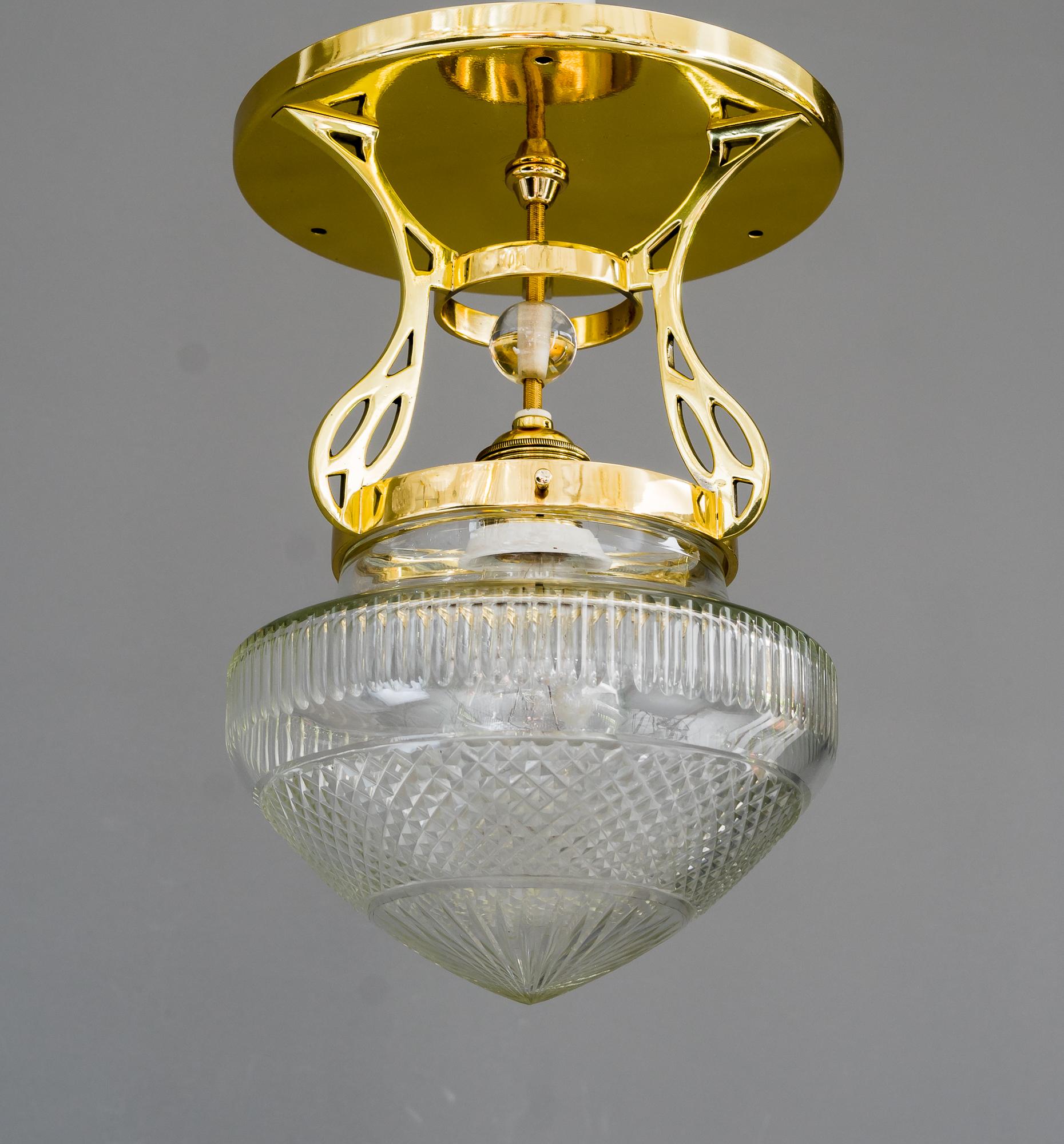 Art Deco ceiling lamp, Vienna around 1920s
Brass polished and stove enamelled
Original antique cut glass shade.