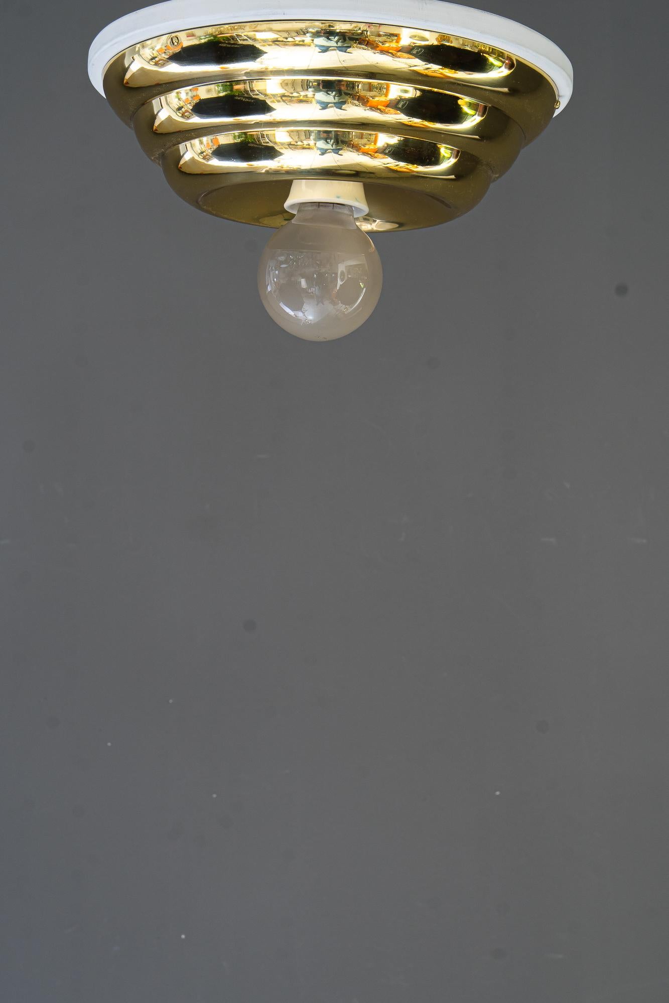 Art deco ceiling lamp vienna around 1920s
Brass polished and stove enameled