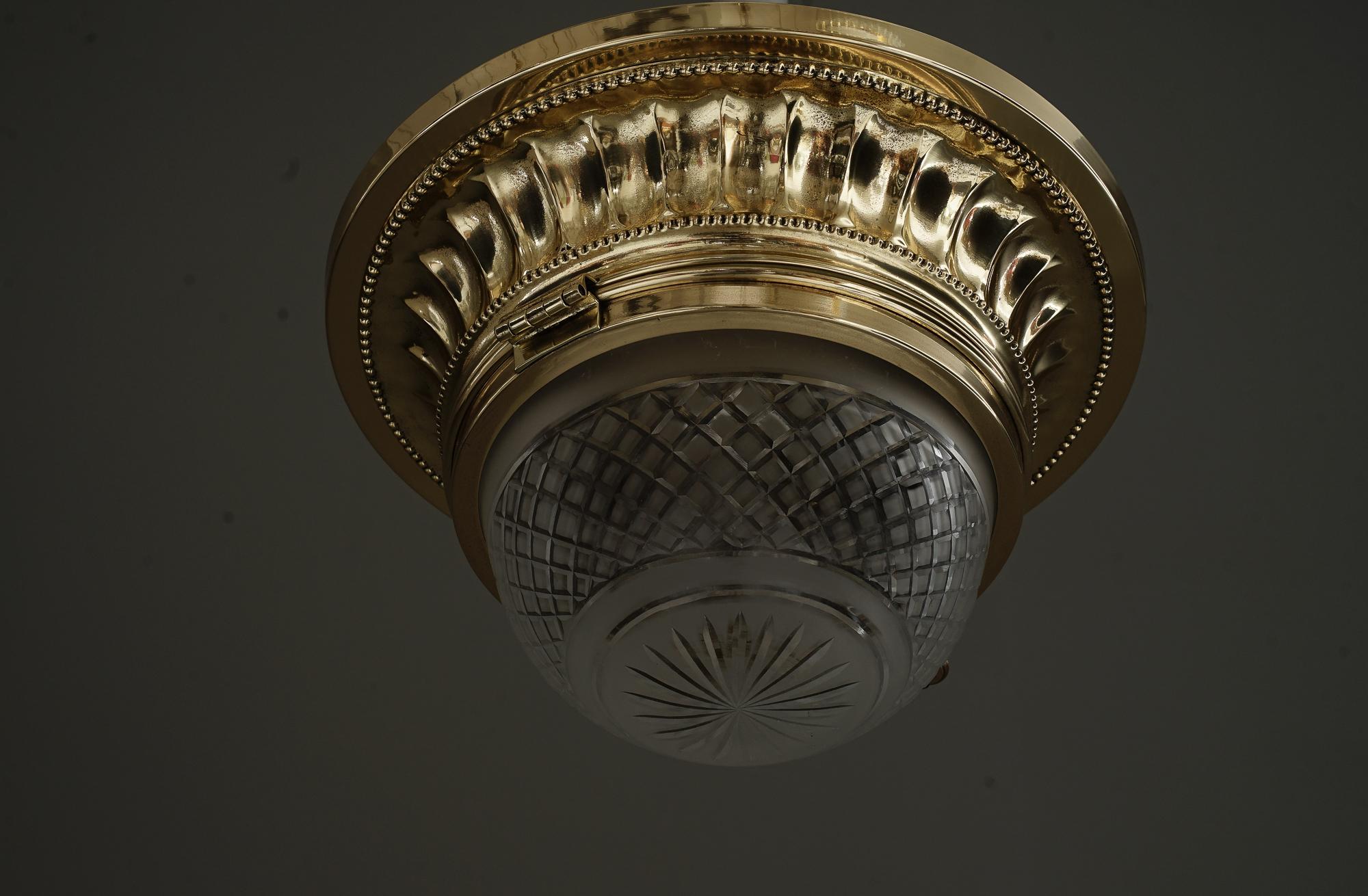 Art Deco ceiling lamp with cut glass shade vienna around 1920s
Polished and stove nenameled
Original cut glass shade.