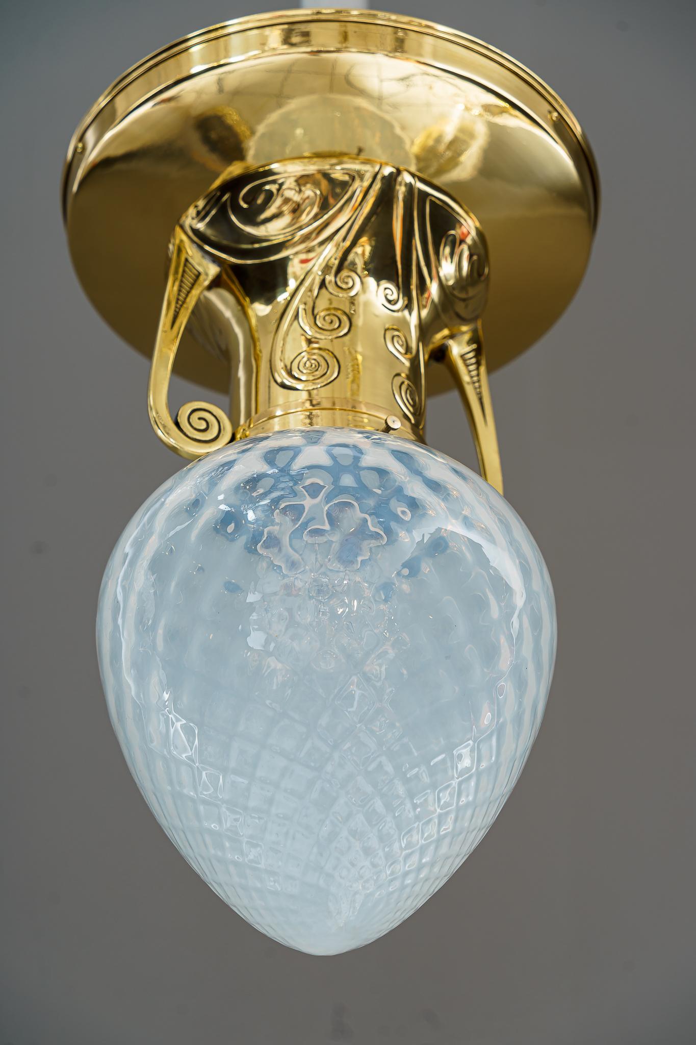 Art Deco ceiling lamp with opaline glass shade vienna around 1920
Polished and stove enameled
Original opaline glass shade.