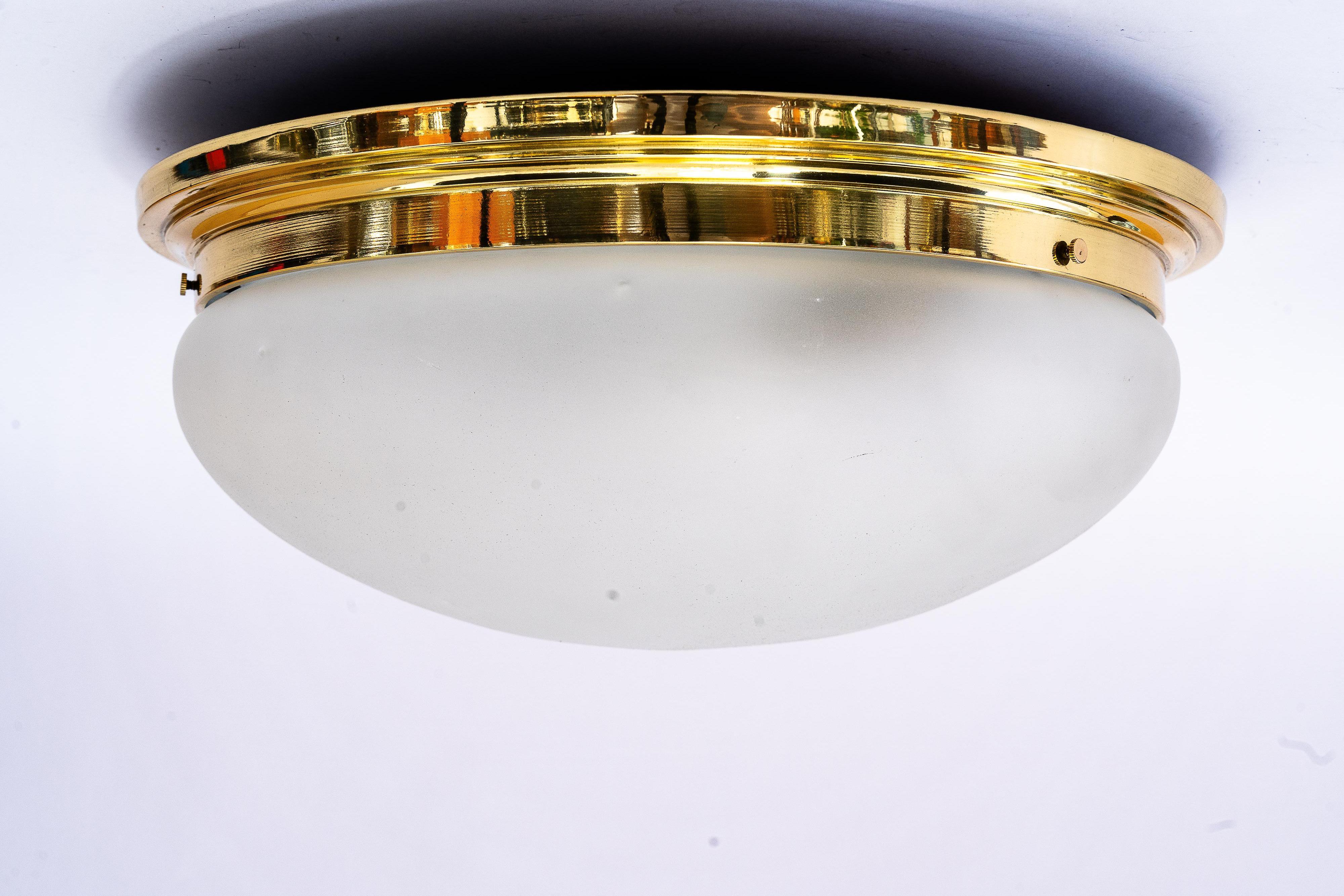 Art Deco ceiling lamp vienna around 1920s
Brass polished and stove enameled
Original frosted glass shade