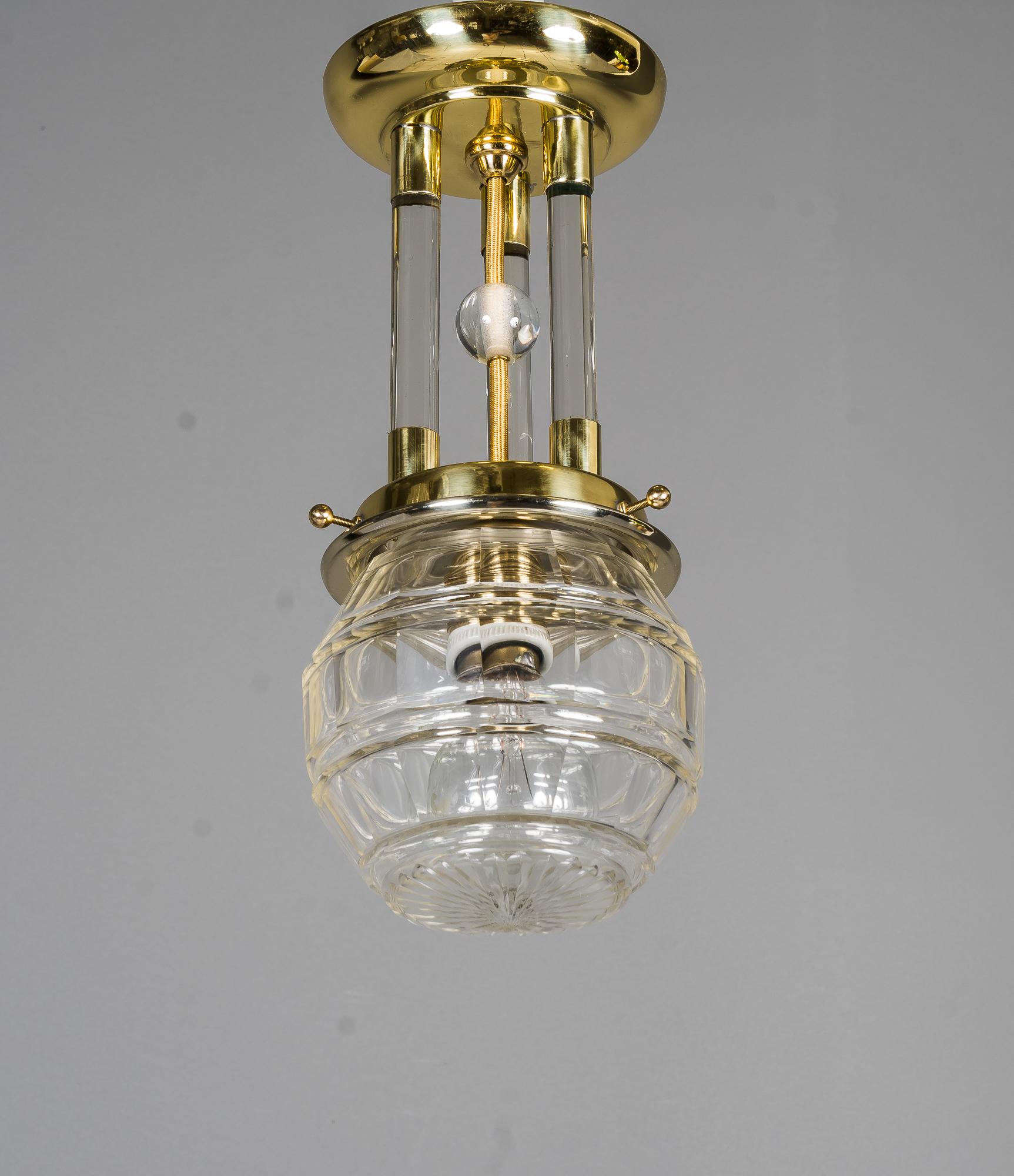 Art Deco ceiling lamp with original old cut glass shade, Vienna, around 1920s 
Brass parts polished and stove enamelled
Original old cut glass shade.
 