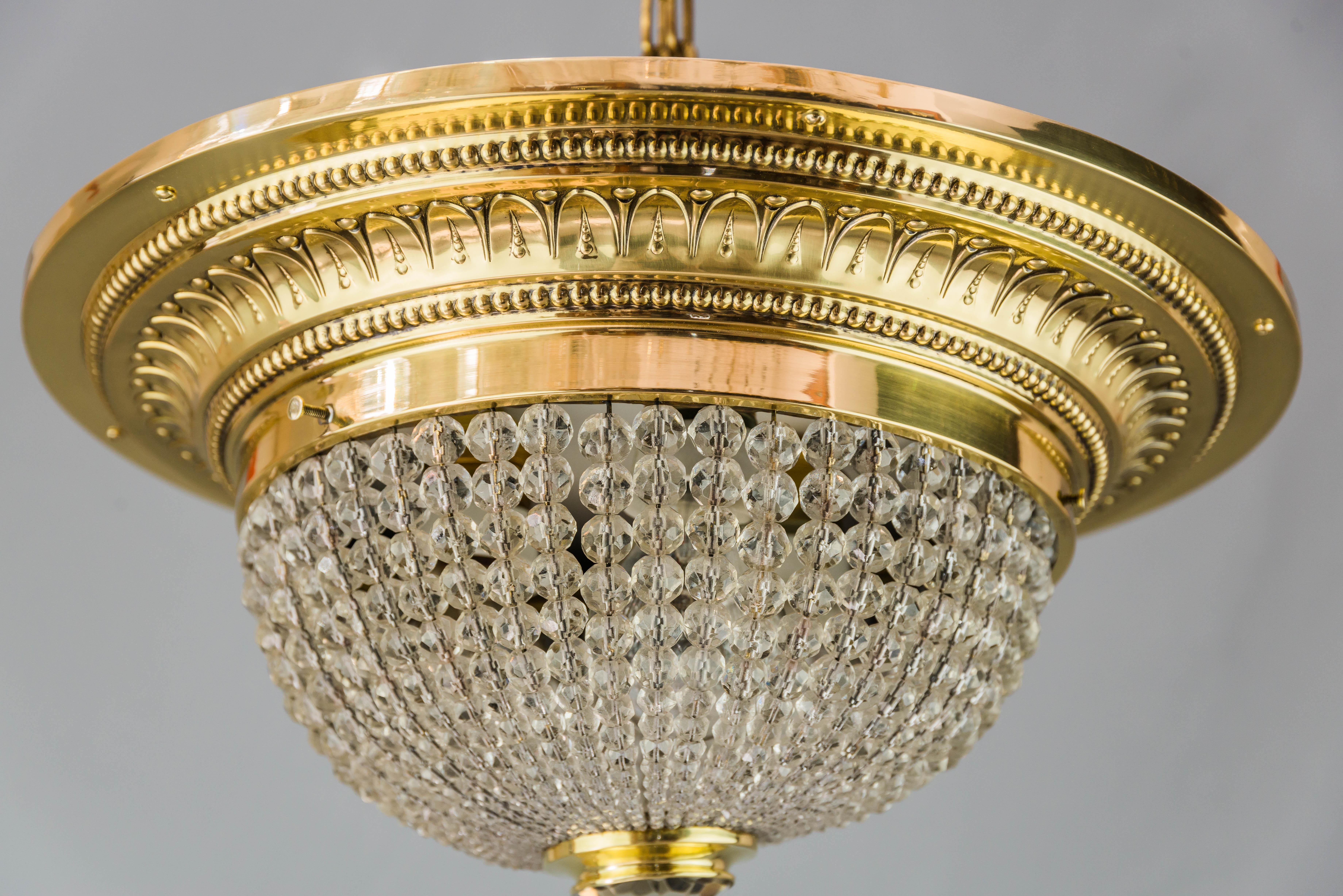 Art Deco ceiling lamp with small cut glass balls, circa 1920s.
Polished and stove enameled.