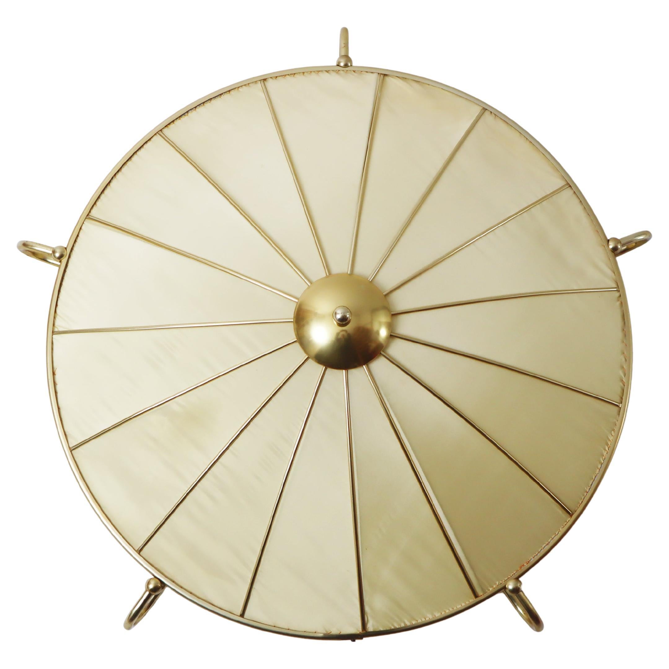 Beautiful lamp from the late Art Deco period by Erco Leuchten. Everything in this lamp is in its original condition. The gold cream-white balloon silk was painstakingly sewn onto the round metal frame by hand. The aluminum was anodized gold and is