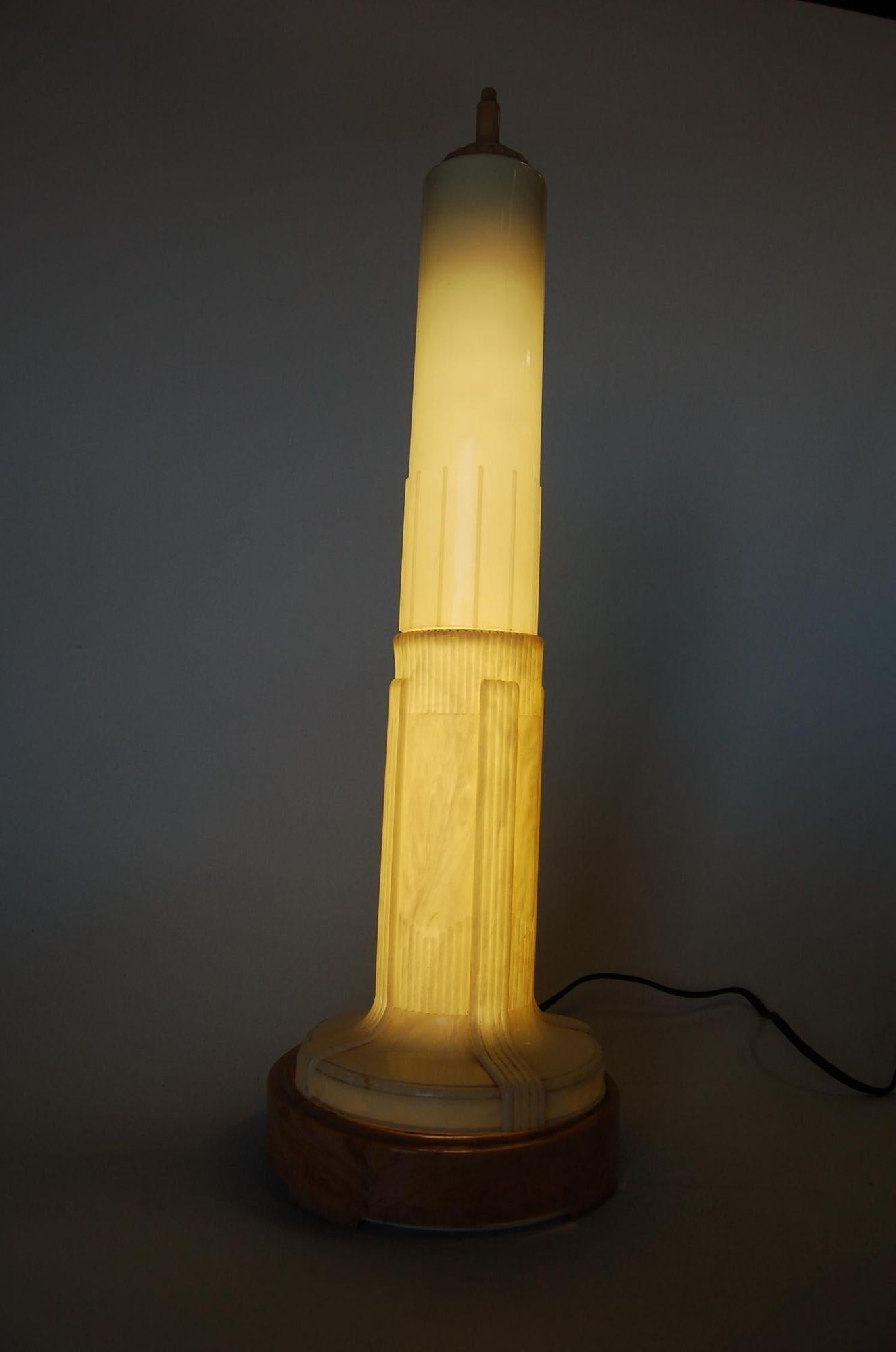 1940s Art Deco celluloid Empire state building fluorescent table lamp. 

Pair available. 

Measures: 7