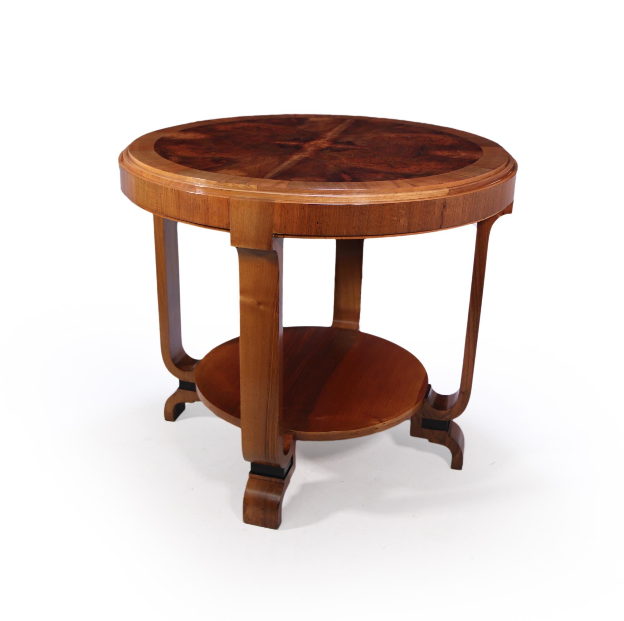 A good sized Greek influenced center table with cross banded walnut top, double stepped standing on shaped legs with a lower tier great quality. The table has been restored where necessary and fully polished by hand and in excellent condition