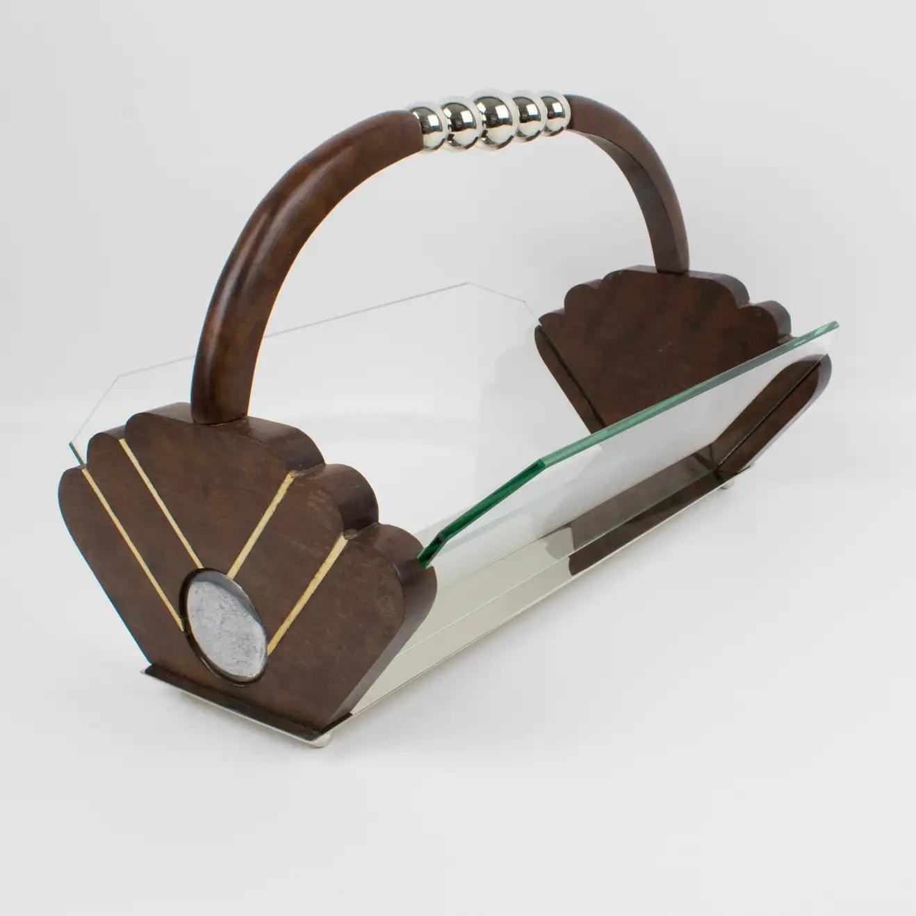 This stylish Art Deco centerpiece, serving bowl, or decorative fruit or bread basket was designed in France circa the 1930s. The serving piece features a wood handle ornate with chromed metal beads. The sides are built in wood with chromed metal