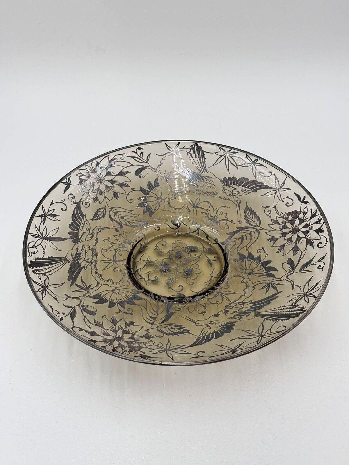 Beautiful sepia-colored centerpiece with early 1930s American-made silver overlay.



Diameter 33 cm



The item is in excellent conservative condition, no cosmetic or structural flaws to report, just slight and obvious signs of time due to use and