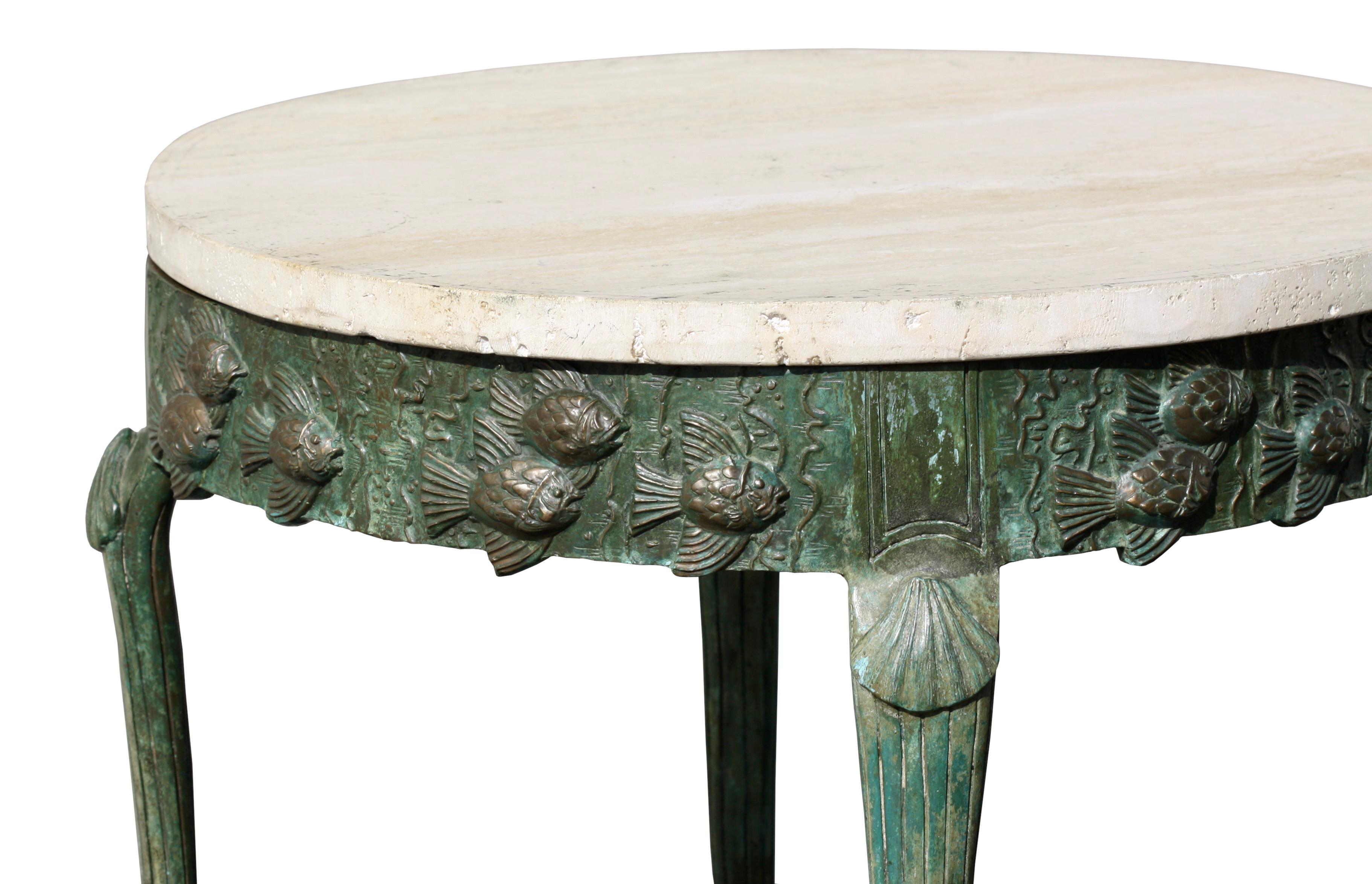 An Art Deco centre table wrought iron and composite marble, the oval top above four green patinated scroll supports, the oval base with four cylindrical feet signed and dated to base 'O.LePecheur 1931 90cm. high by 136cm. deep by 150cm. wide;2ft