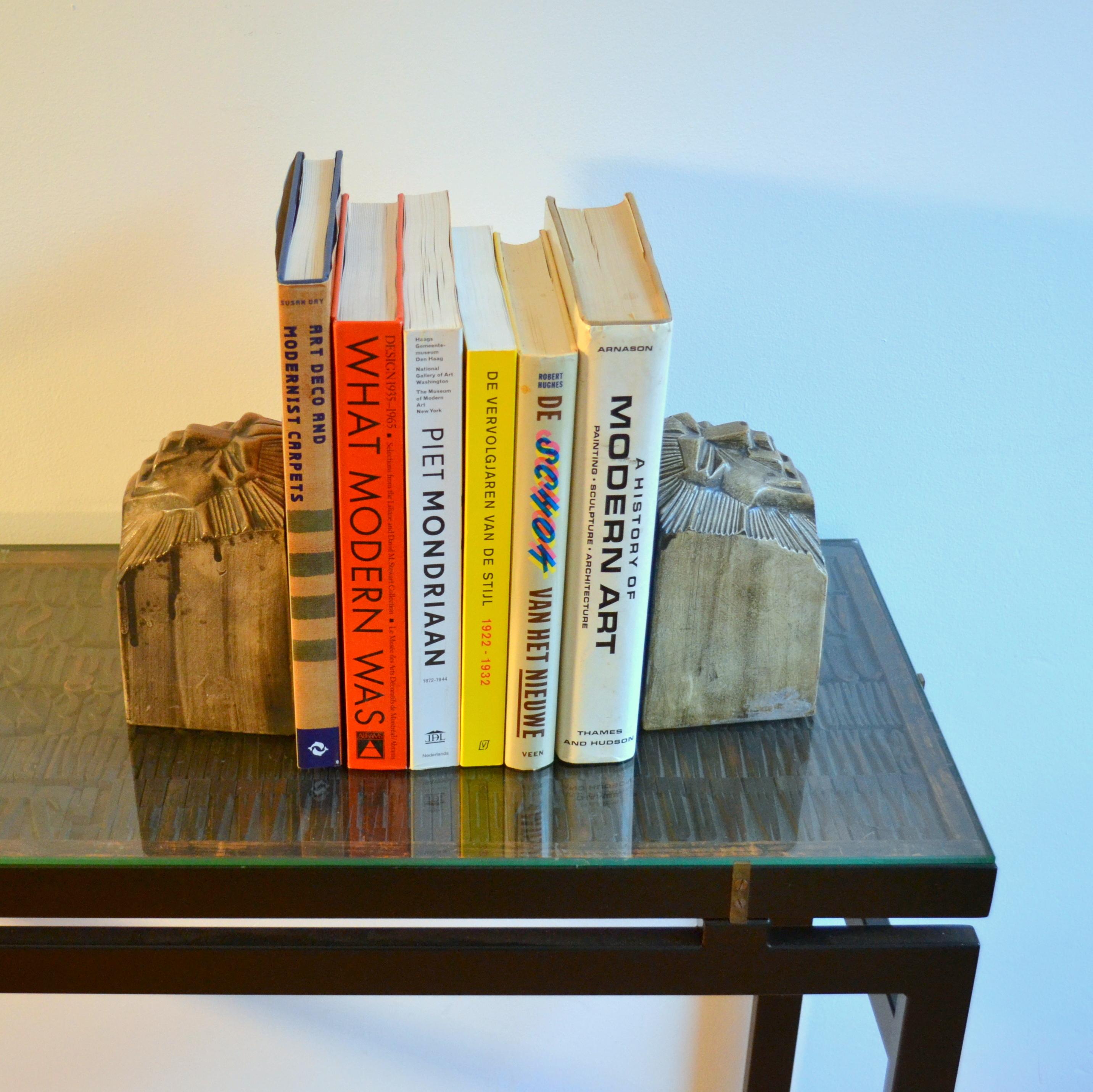 Dutch Art Deco Bookends in Ceramic with the Shape of Lion Heads For Sale