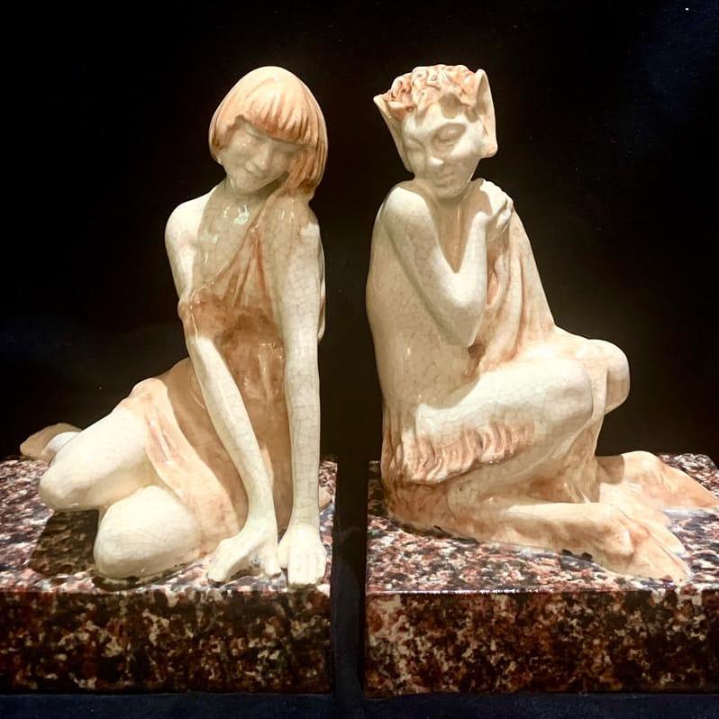  An extremely rare pair of Art Deco crackle glazed bookends circa 1925 with a sitting faun or satyr and nymph by the famous french artist Pierre Le Faguays. Signed to the base . Good vintage condition.
Depicted in the book:
“Art deco and other