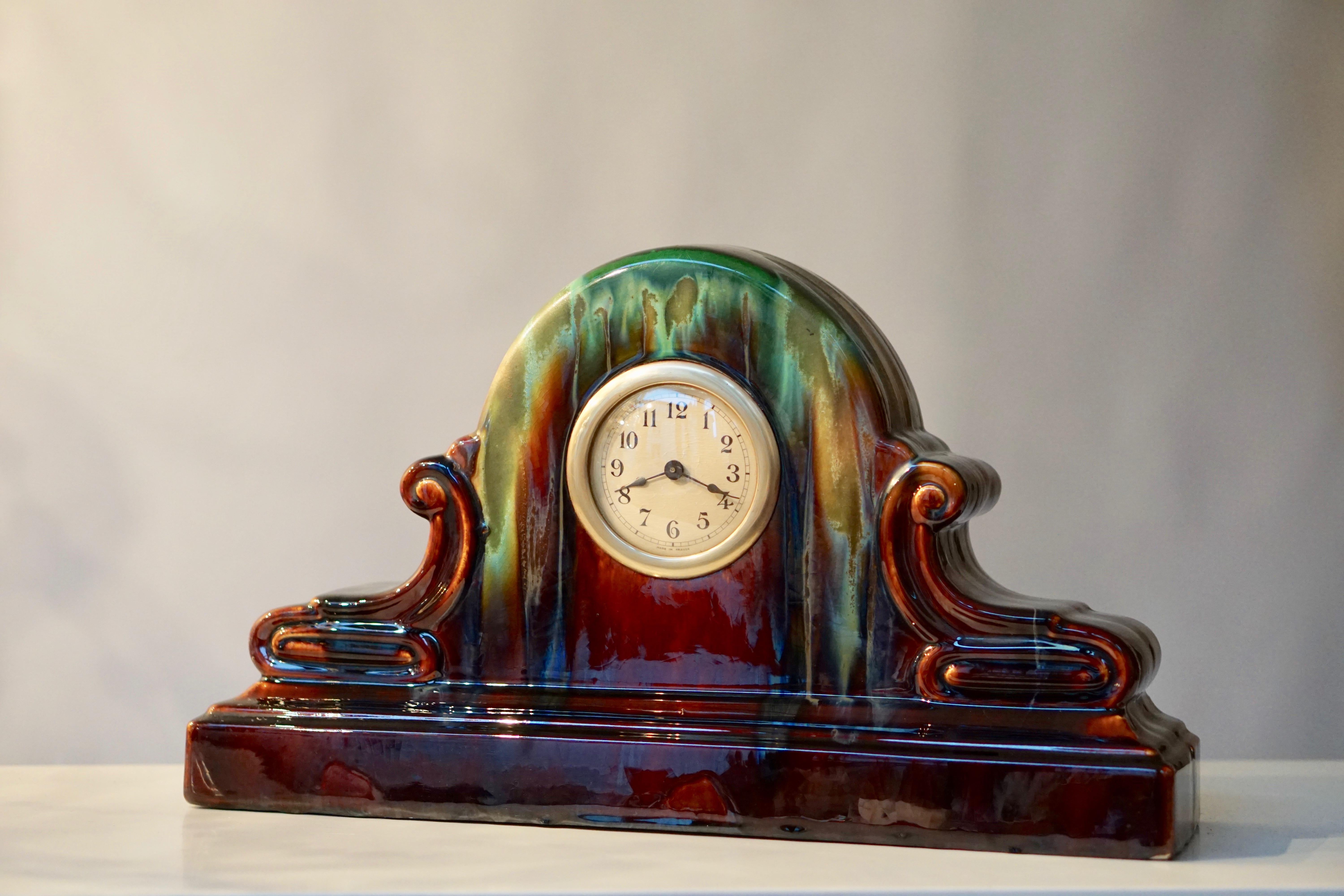 French ceramic Art Deco mantel orb table clock.
Width 45 cm.
Height 27 cm.
Depth 12 cm.