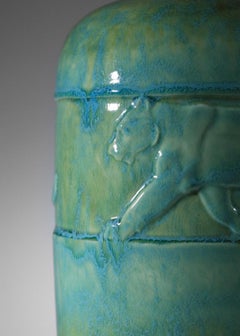 Art deco ceramic lamp base with green enamel panther decor René Meynial