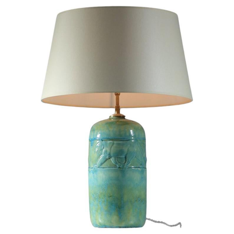 Art deco ceramic lamp base with green enamel panther decor René Meynial