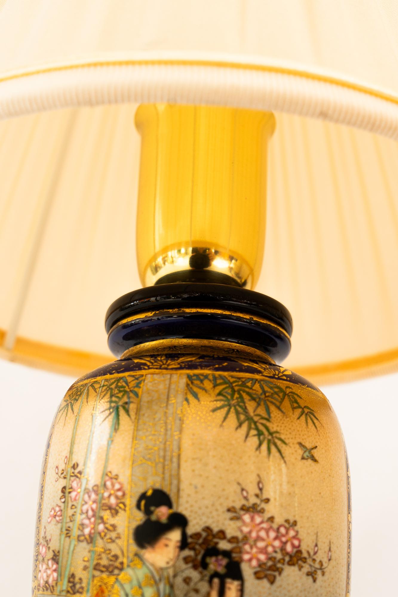 Early 20th Century Art Deco ceramic table lamp with fabric shade vienna around 1920s For Sale