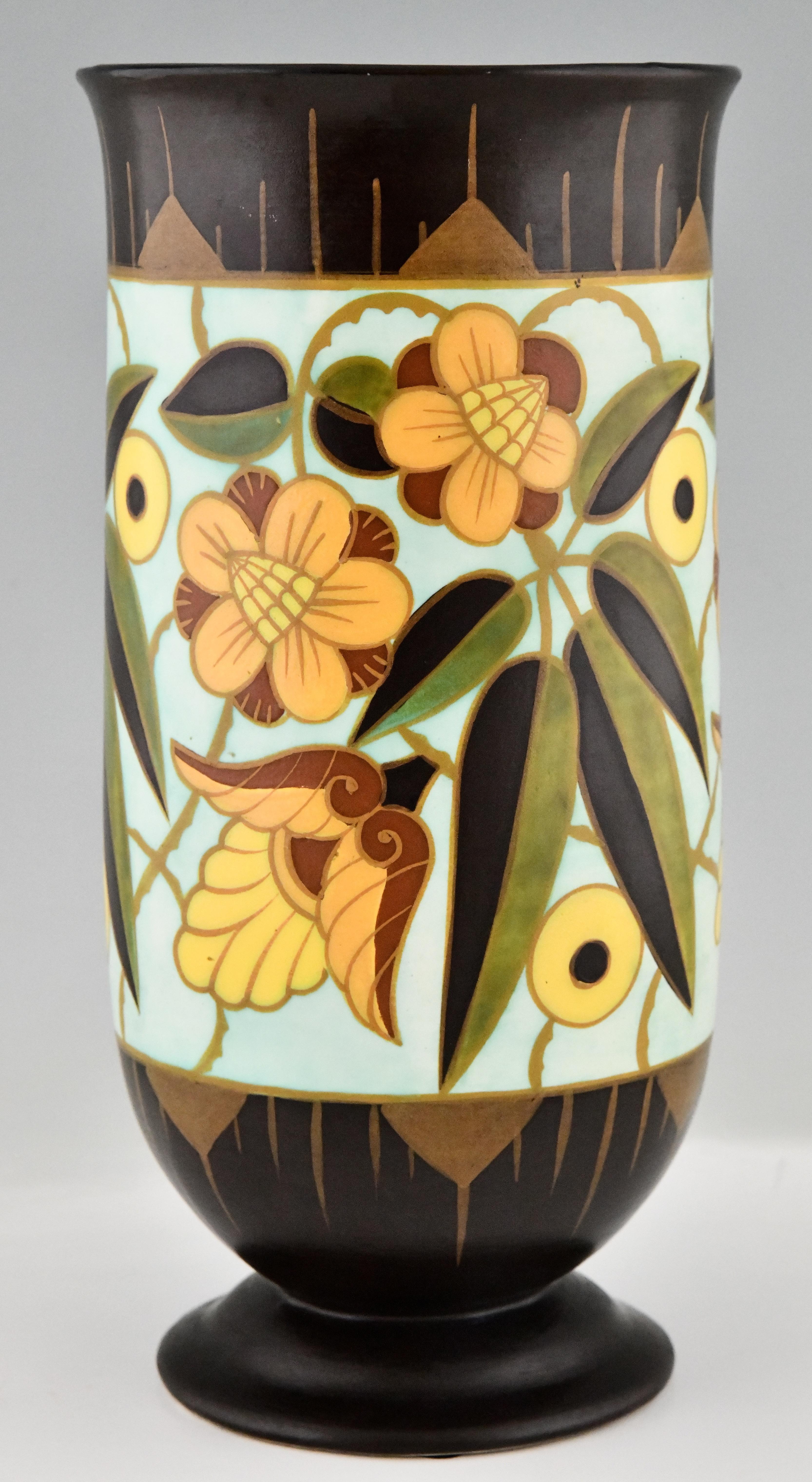 Art Deco ceramic vase with flowers by Boch Frères, Keramis. 
Marked with the Keramis stamp, Numbered D1847 for the decor.
Ceramic, matte enamel. Belgium, 1934. 
Literature:
Art Deco Ceramics, Charles Catteau by Marc Pairon
L'homme de Keramis Charles