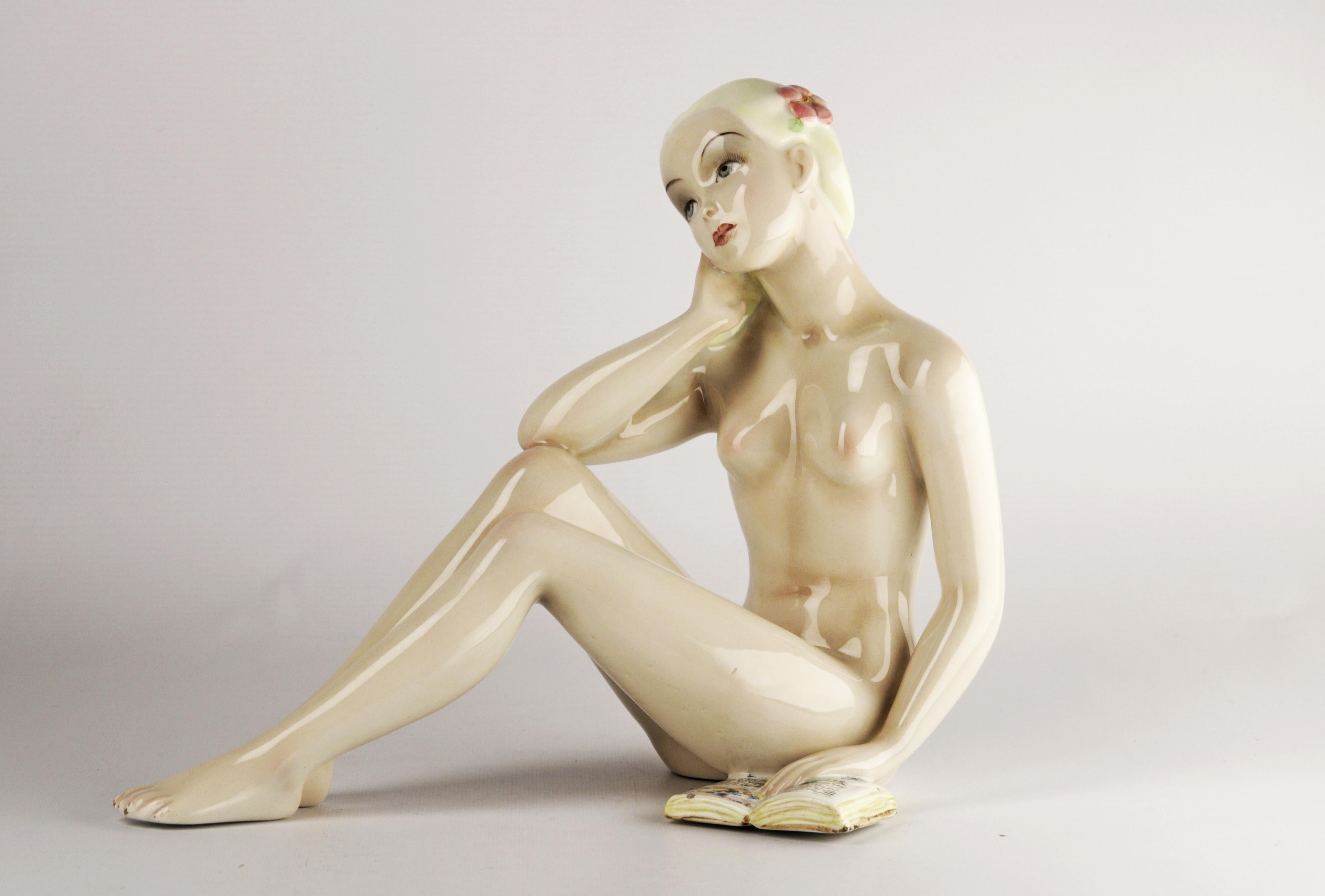 Mid-20th century glazed ceramic naked woman figure sculpture from Torino, Italy

By: unknown
Material: ceramic, paint
Technique: glazed, painted, pressed, molded, hand-painted
Dimensions: 4 in x 12 in x 9
Date: mid-20th century, post-war,