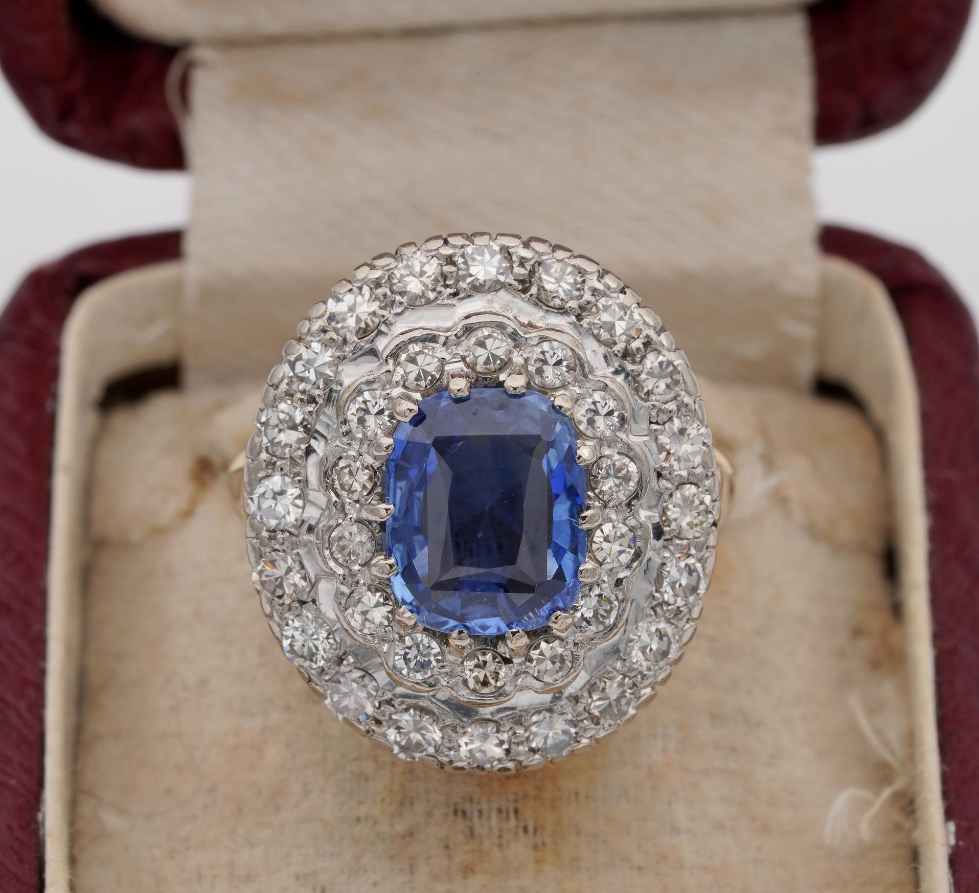 Past Statement
Imposing classy style from the late Art Deco period designed in a large oval crown with two tiers of Diamonds surrounding a fantastic natural Sapphire, a statement ring from past times
Entirely hand crafted of solid Platinum for the