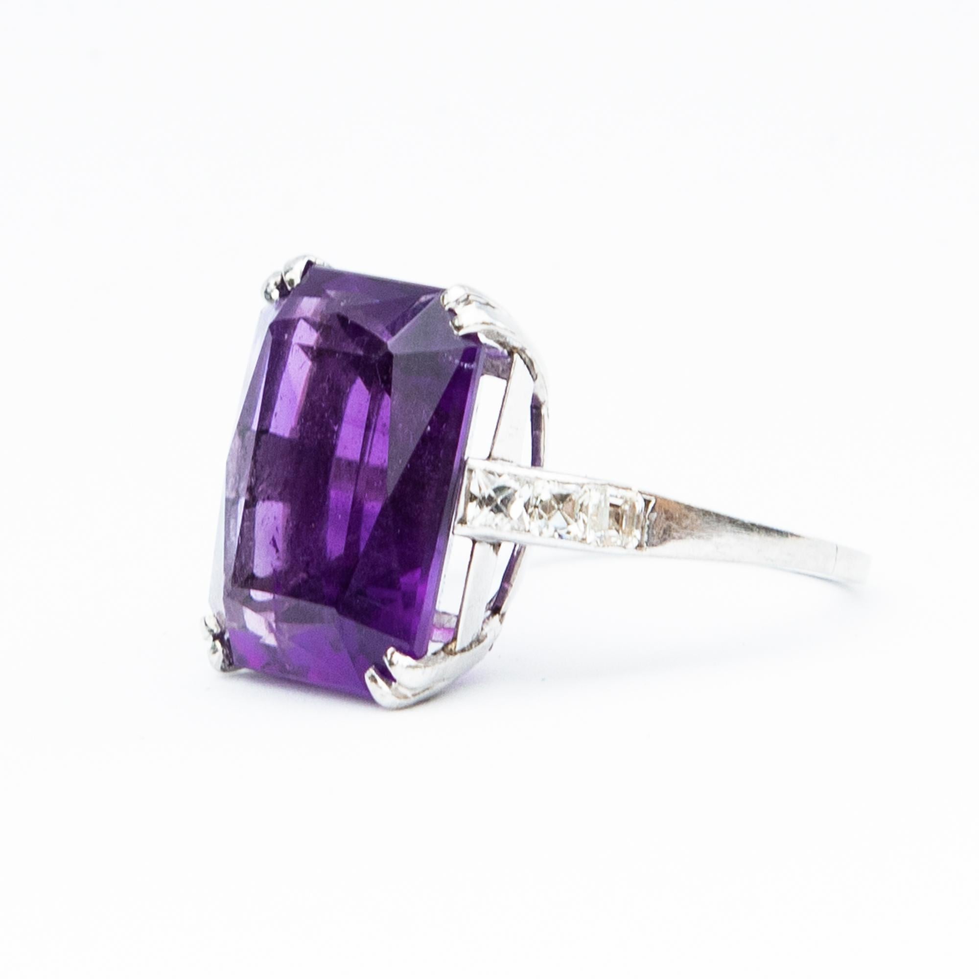 This spectacular Siberian Amethyst measuring just over 13.54 carats is beautifully set in platinum with tapering French Cut diamond shoulders. Total diamond weight certified 48 points, G colour and VS2 clarity.

Head: 17.5 x 13.8 mm 
Ring Size: Q