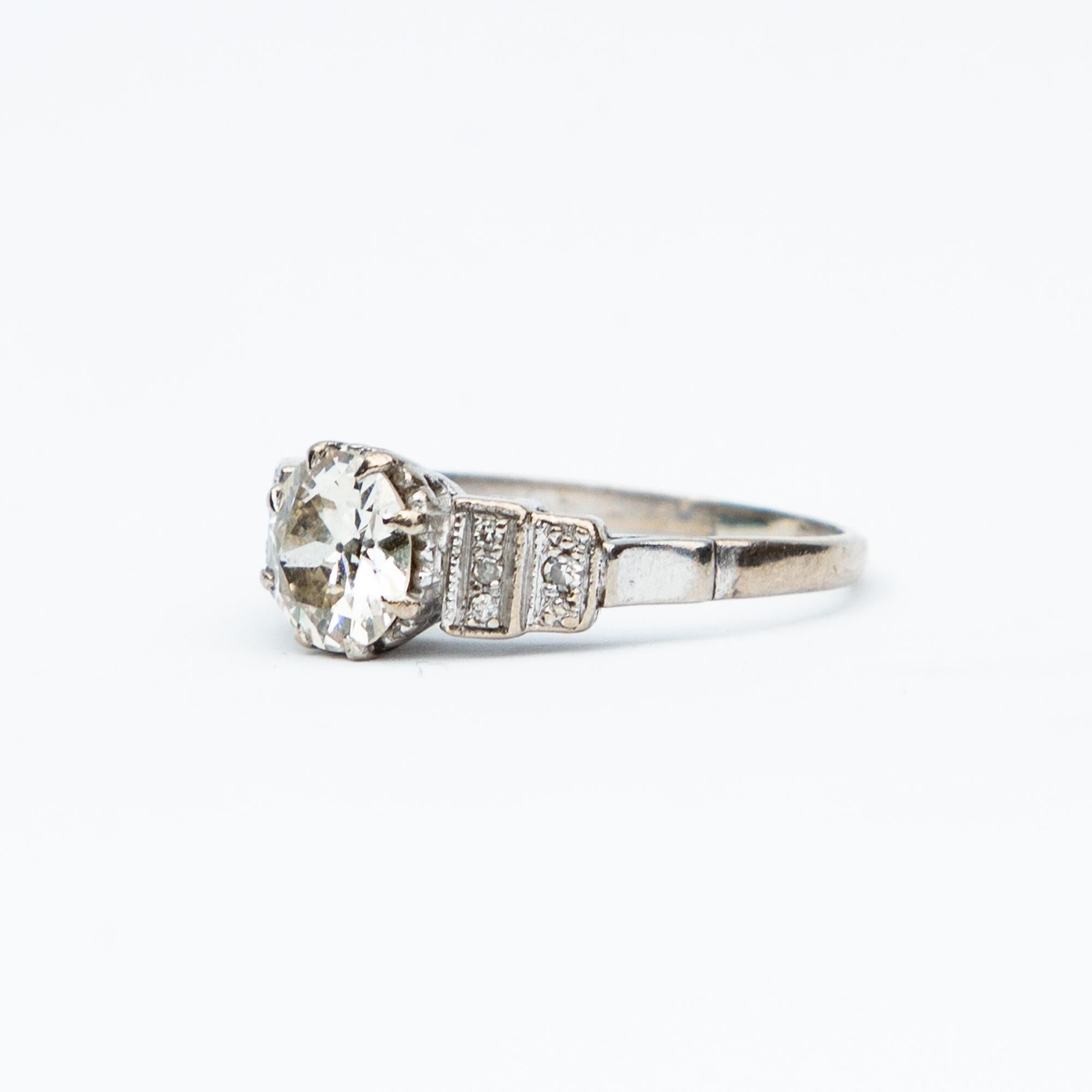 An absolutely stunning example of an Art Deco Diamond solitaire ring, beautifully set with stepped shoulders in a platinum setting. The central Old European Cut diamond is certified 1.65 carats, I colour and VS2 clarity.

Ring Size M or