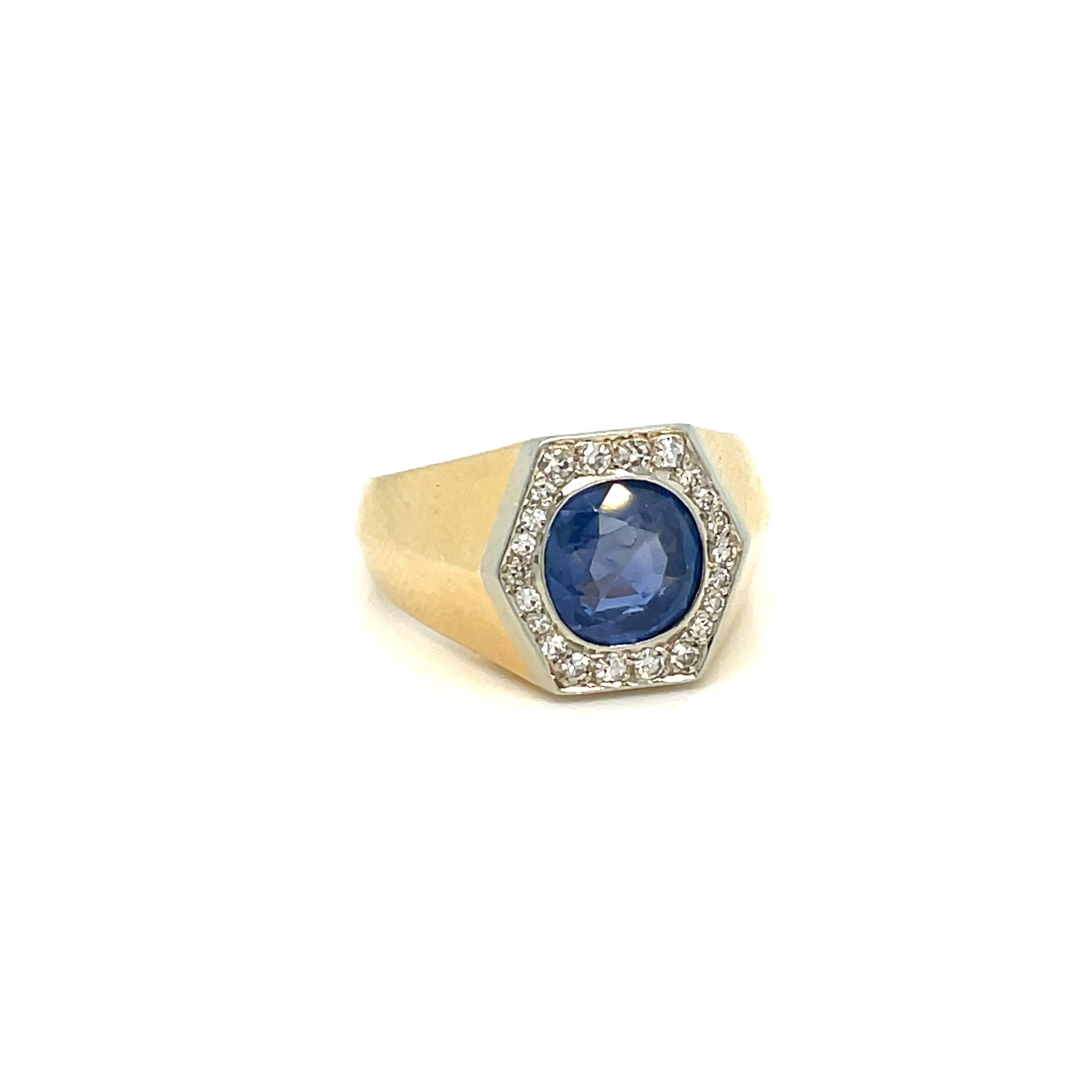 An exquisite genuine Art Deco ring handcrafted in Platinum & Yellow gold by master jewelers, featuring a beautiful vivid 2.50 carat Unheated untreated Natural Ceylon Sapphire cushion-shape, surrounded by 0.50 carats of old cut diamonds.

The