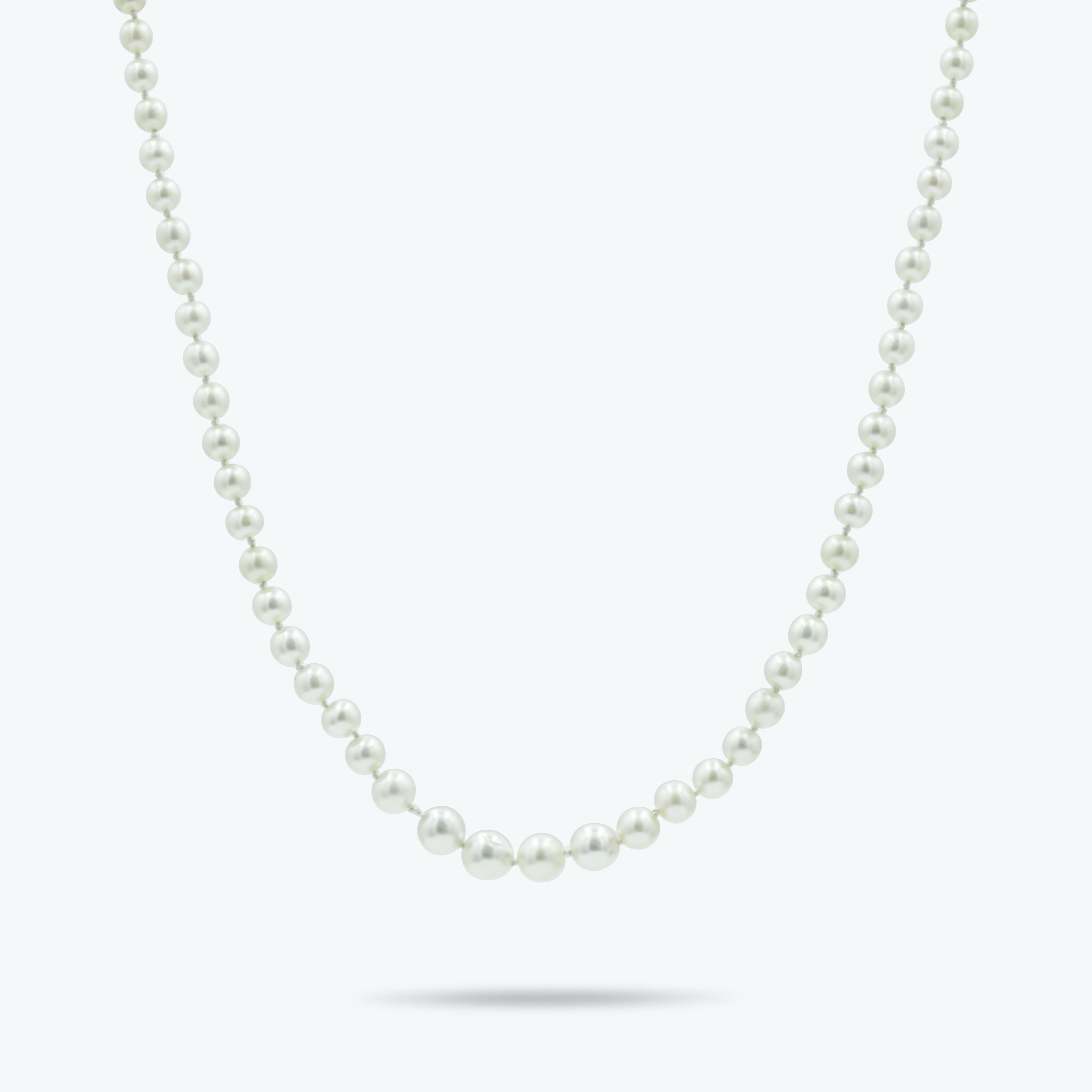 This exquisite platinum Art Deco necklace features a stunning strand of certified natural saltwater pearls, elegantly graduated to create a a perfect necklace for stacking your chains. Notably, all the pearls are natural saltwater pearls and are GIA