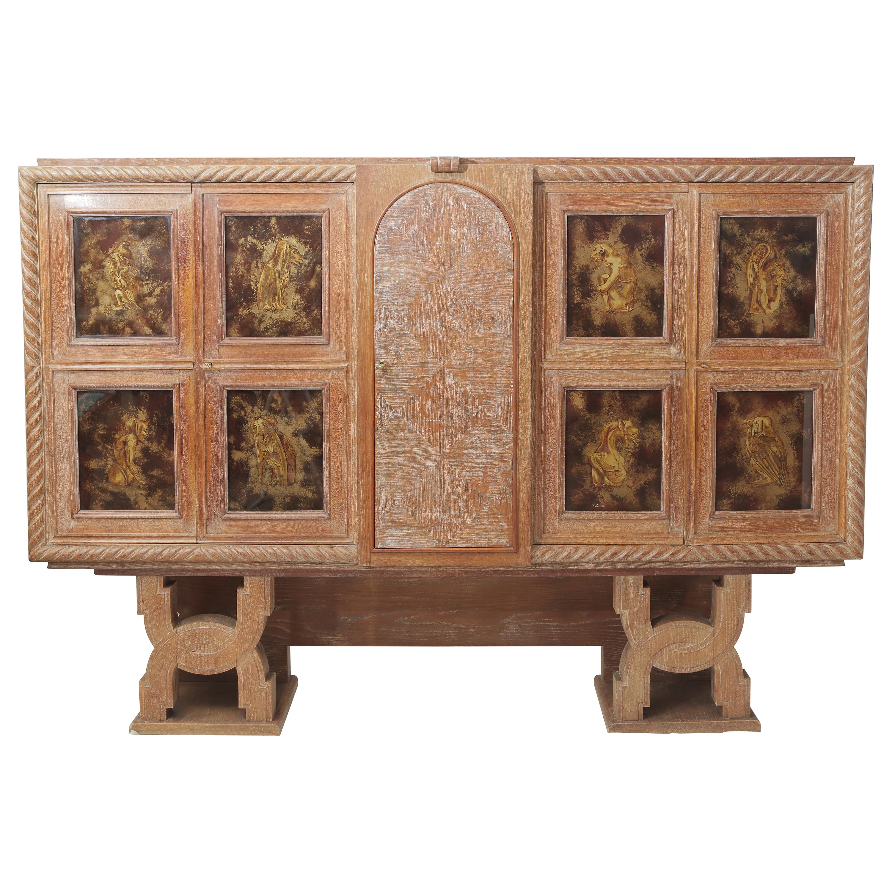 Art Deco Cerused Oak & Verre Églomisé Cabinet in the Style of Moreux, circa 1940