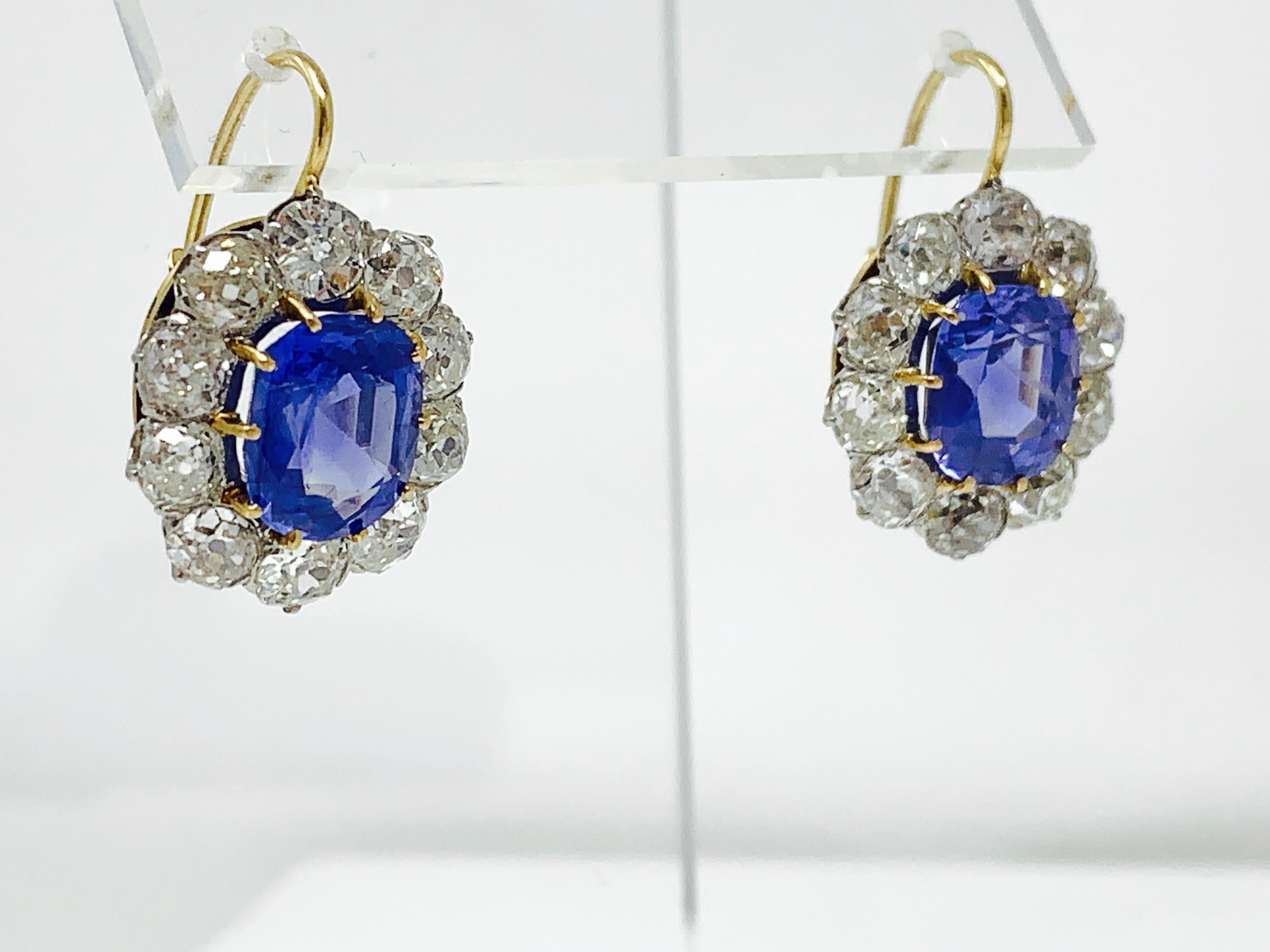 Moguldiam Inc Vintage Ceylon Blue Sapphire And Diamond Dangle earrings In 18K Yellow Gold And Platinum. 
Blue Sapphire Weight : 8 carat 
Diamond Weight : 7 carat 
measurements : 1 inch long 
metal : 18 k yellow gold and platinum 
Certificate : AGL