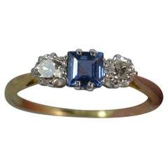 Vintage Art Deco Ceylon Sapphire 0.4 Carat Diamond 18 Carat Gold Trilogy Ring circa 1930