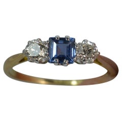 Vintage Art Deco Ceylon Sapphire 0.4 Carat Diamond 18 Carat Gold Trilogy Ring circa 1930