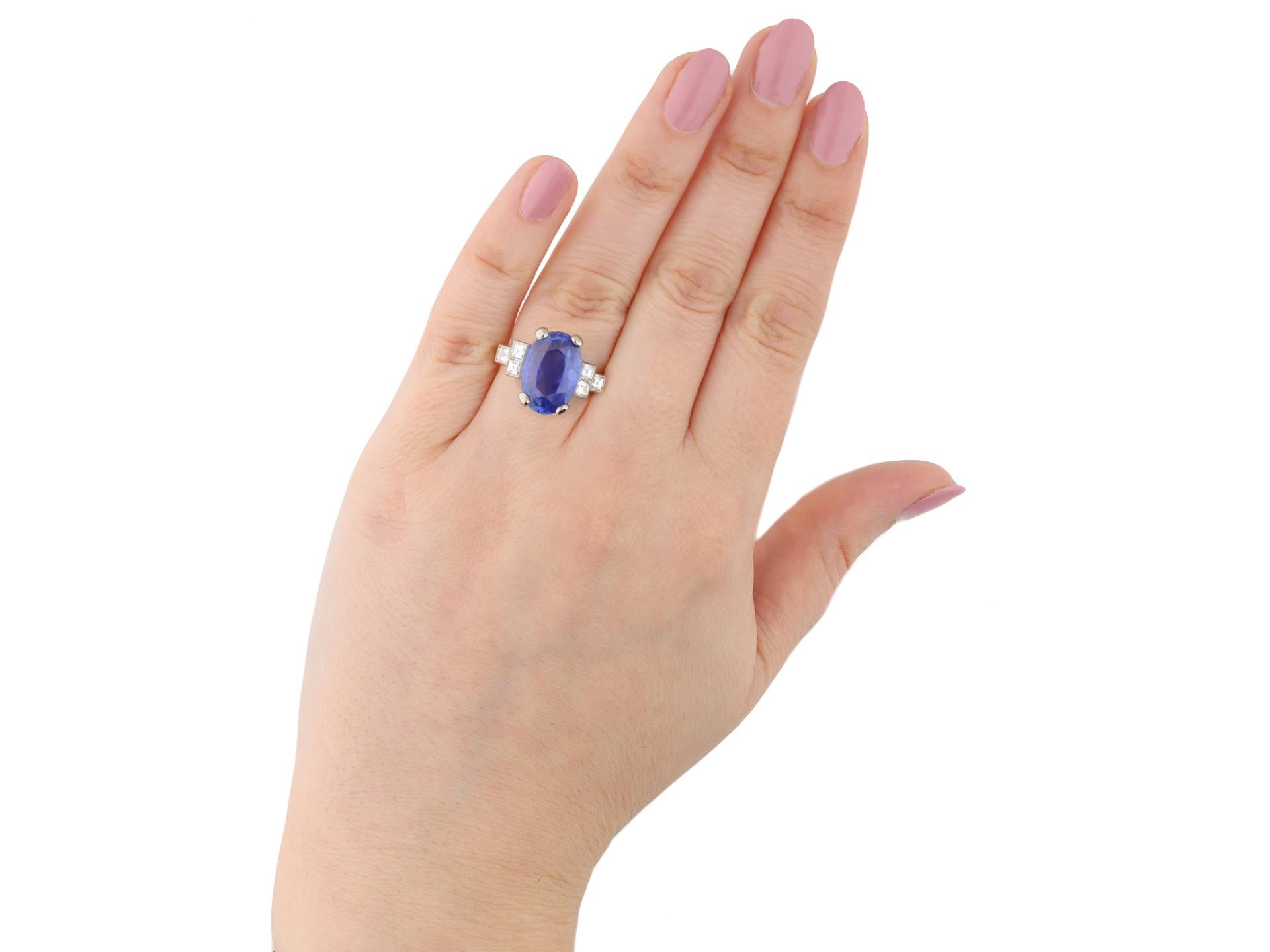 Oval Cut Art Deco Ceylon Sapphire and Diamond Flanked Solitaire Ring, circa 1920 For Sale