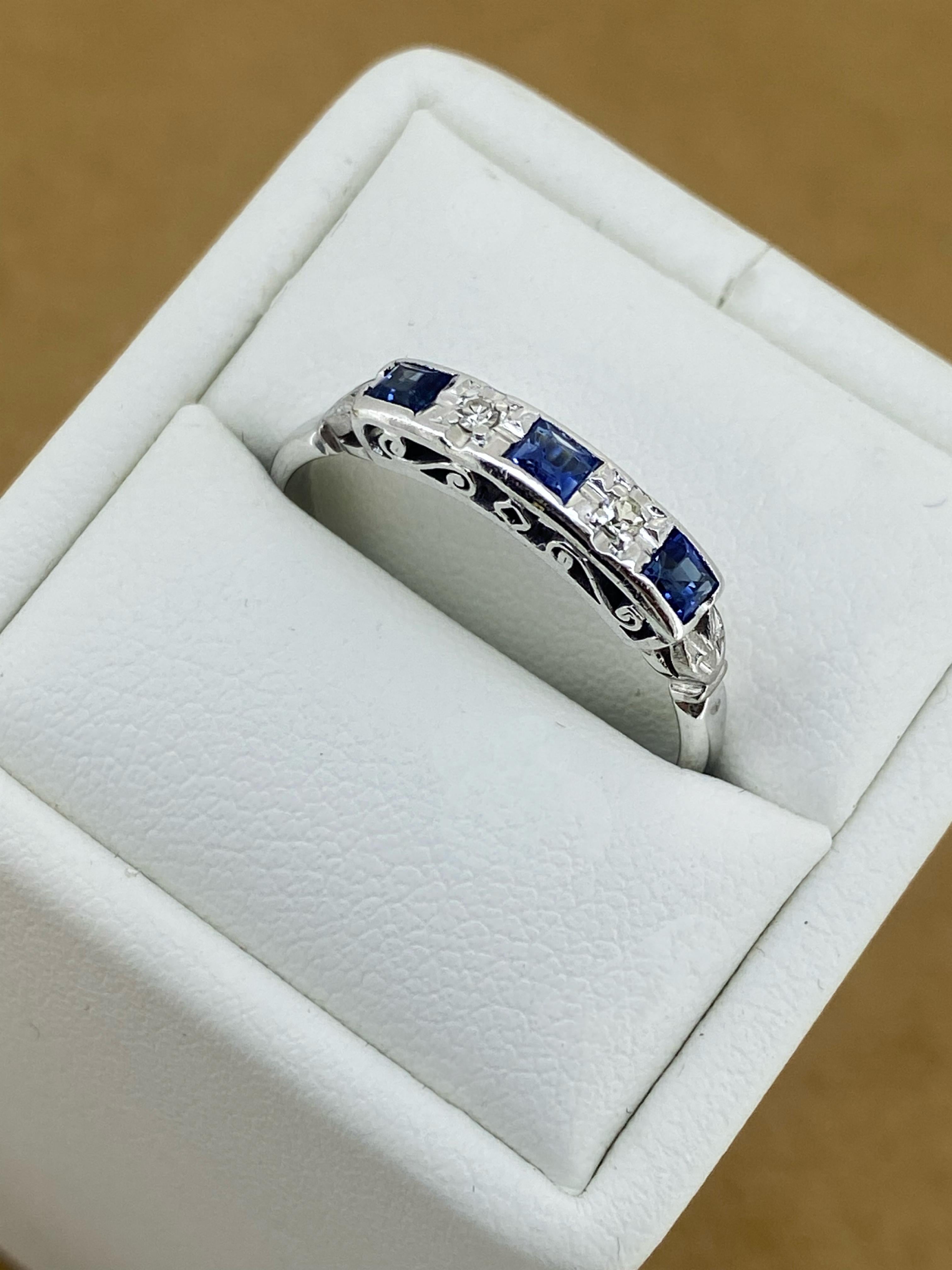 Of elegant, timeless & easy-to-wear design, 

this half hoop band is Art-Deco, 

dating back to 1930's 

 

~~~

 

Set with 3 Princess Cut Natural Sapphires

of Ceylon origin,

of vivid & vibrant royal blue colour & excellent clarity 

totalling