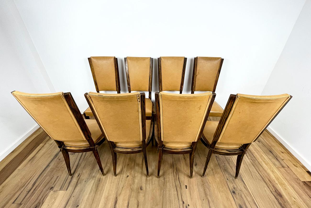 Art Deco chairs 8 pieces made of beech painted in Macassar
8 Art Deco around 1930 from France
Art Deco chairs with brown leather from France circa 1930 painted in Makassar
Original Art Deco furniture from a time full of life and elegance. We get