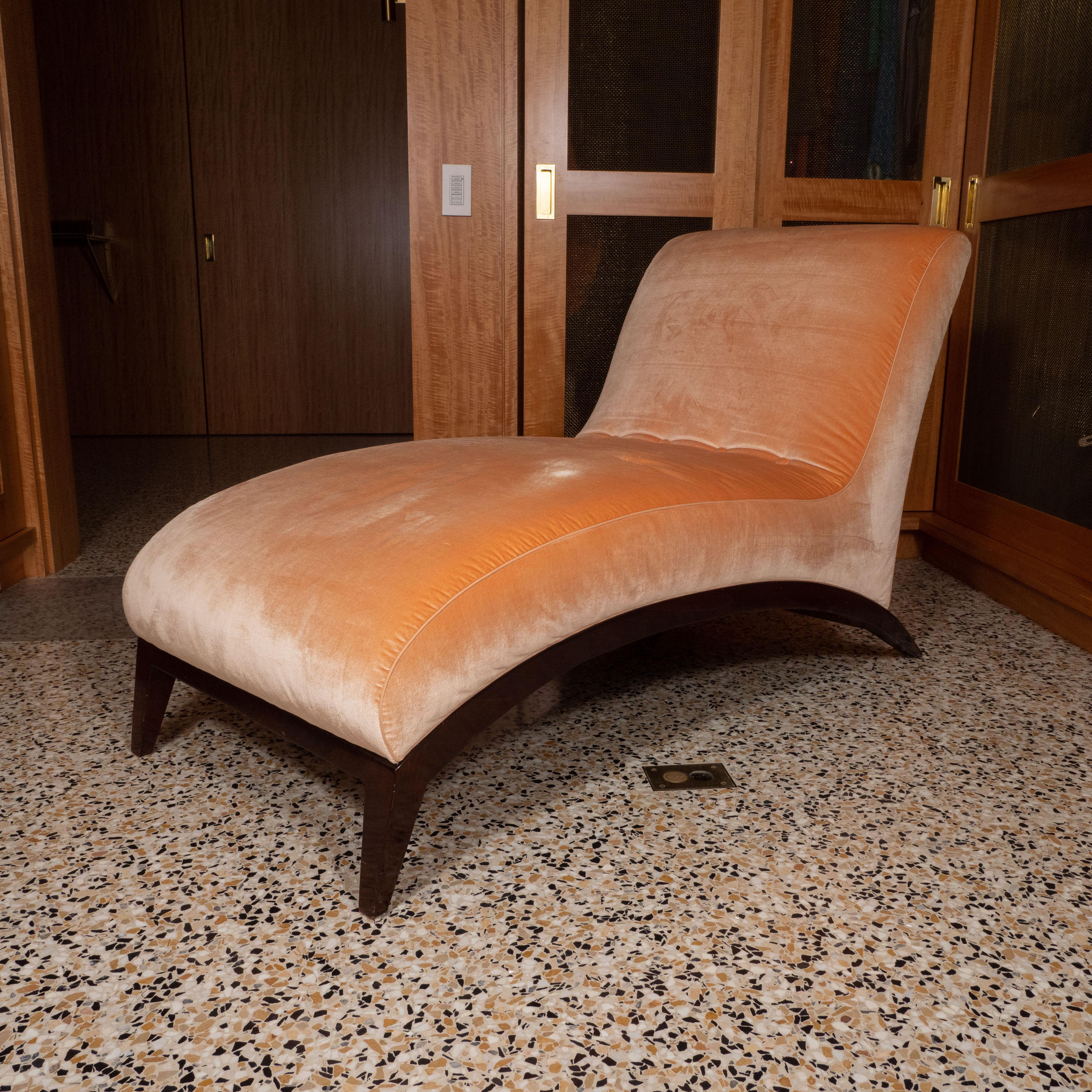Art Deco chaise lounge with tight seat back and wood legs, USA, circa 1930-1940.

Reupholstered in pink mohair in 2012.