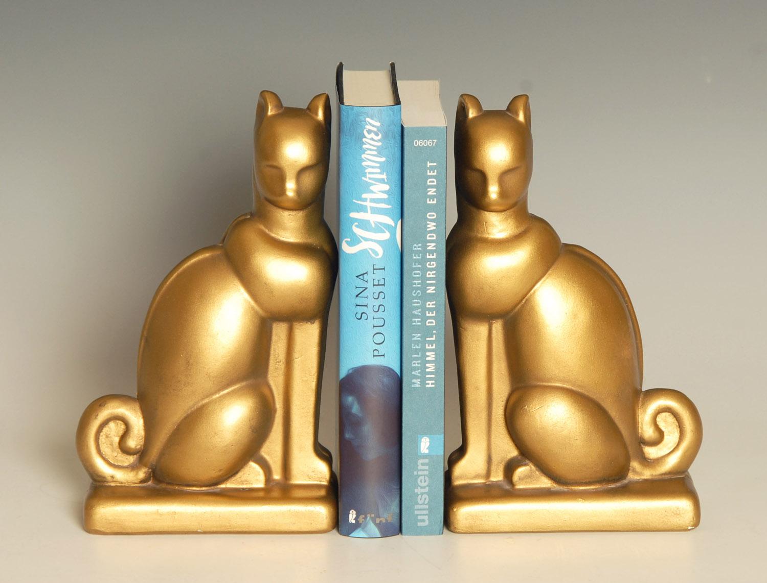 Large Art Deco chalkware / plaster, gold-painted Egyptian cat bookends.

Price includes free shipping to anywhere in the world.
 