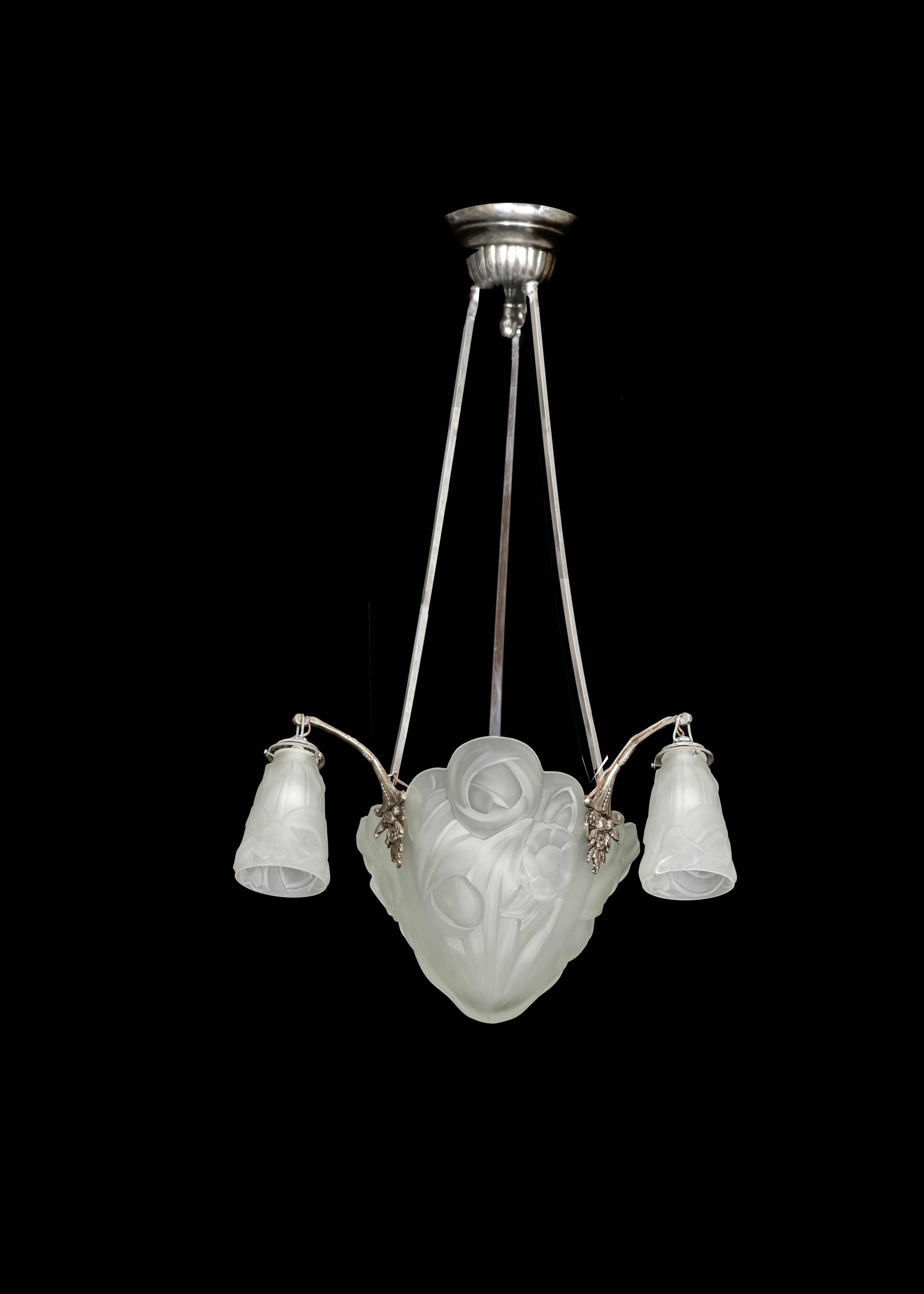 A Geometric glass etched curved Art Deco chandelier with three arms, shaded glass and nickel-plated bronze, fully rewired from  Henri Petitot  DeGue & A.
Petitot Designs and manufactured in the 1930s in collaboration with David Gueron Degue