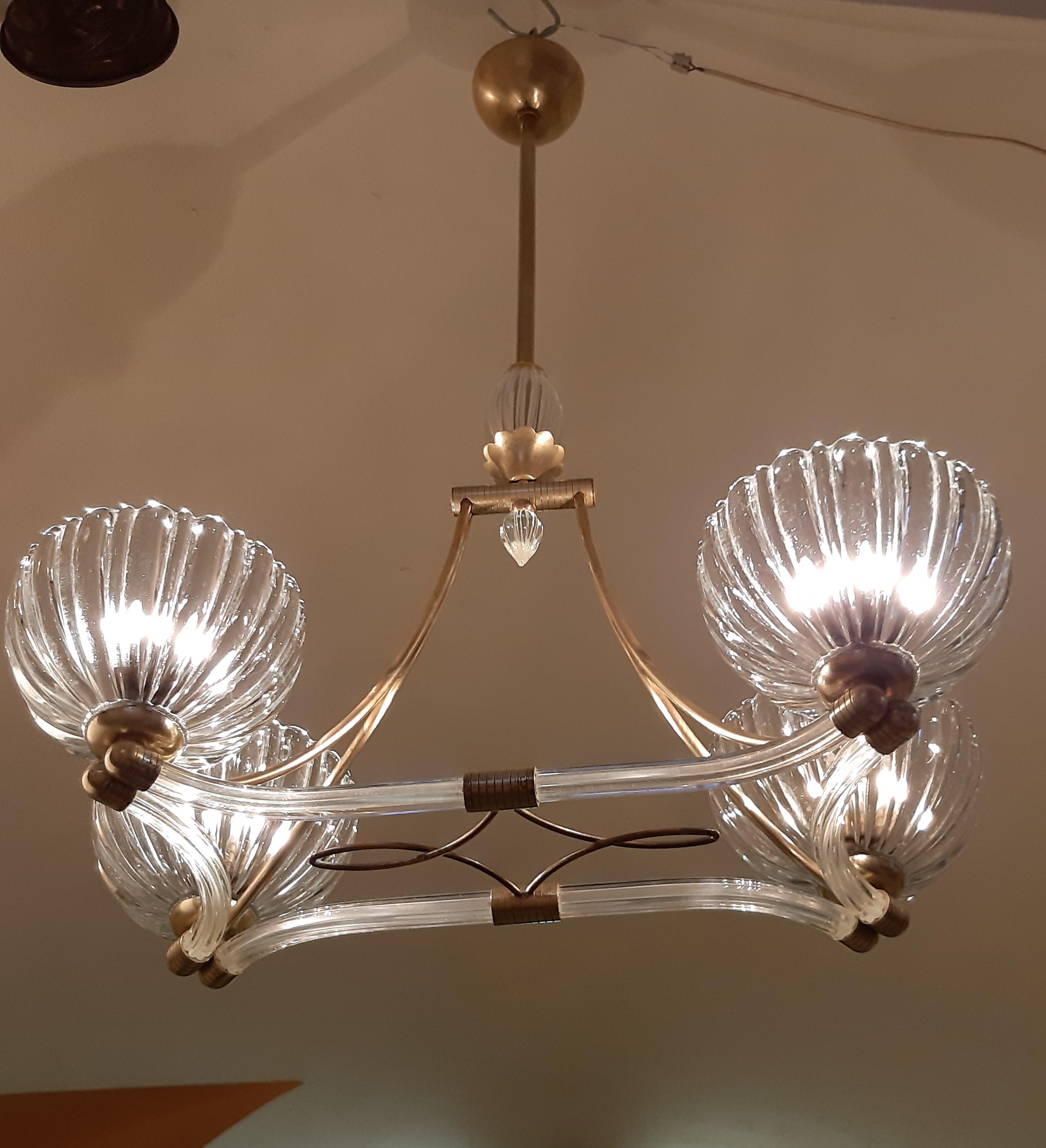 Elegant Murano chandelier by the famous Venetian master Ercole Barovier.
From the private collection of Baron Von Plant.
  