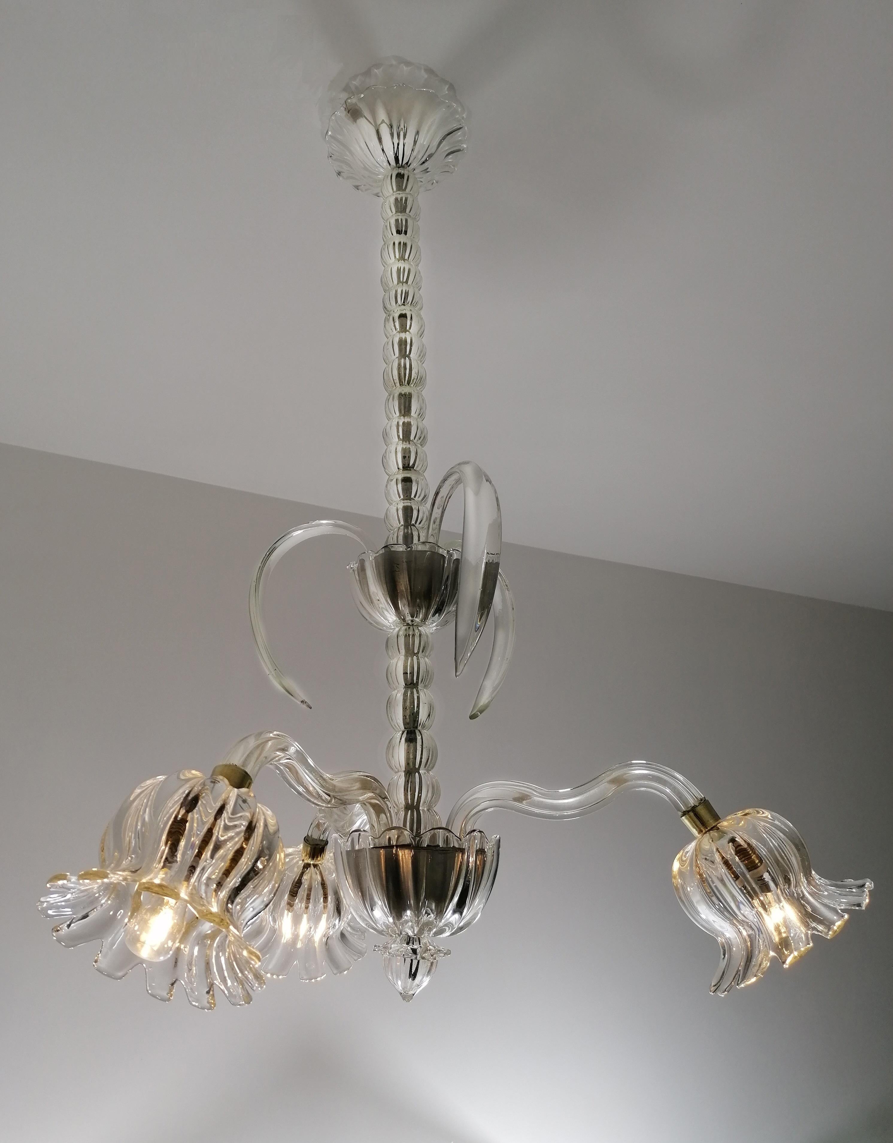 Elegant Murano chandelier by the famous Venetian master Ercole Barovier. 
Three cups.

 