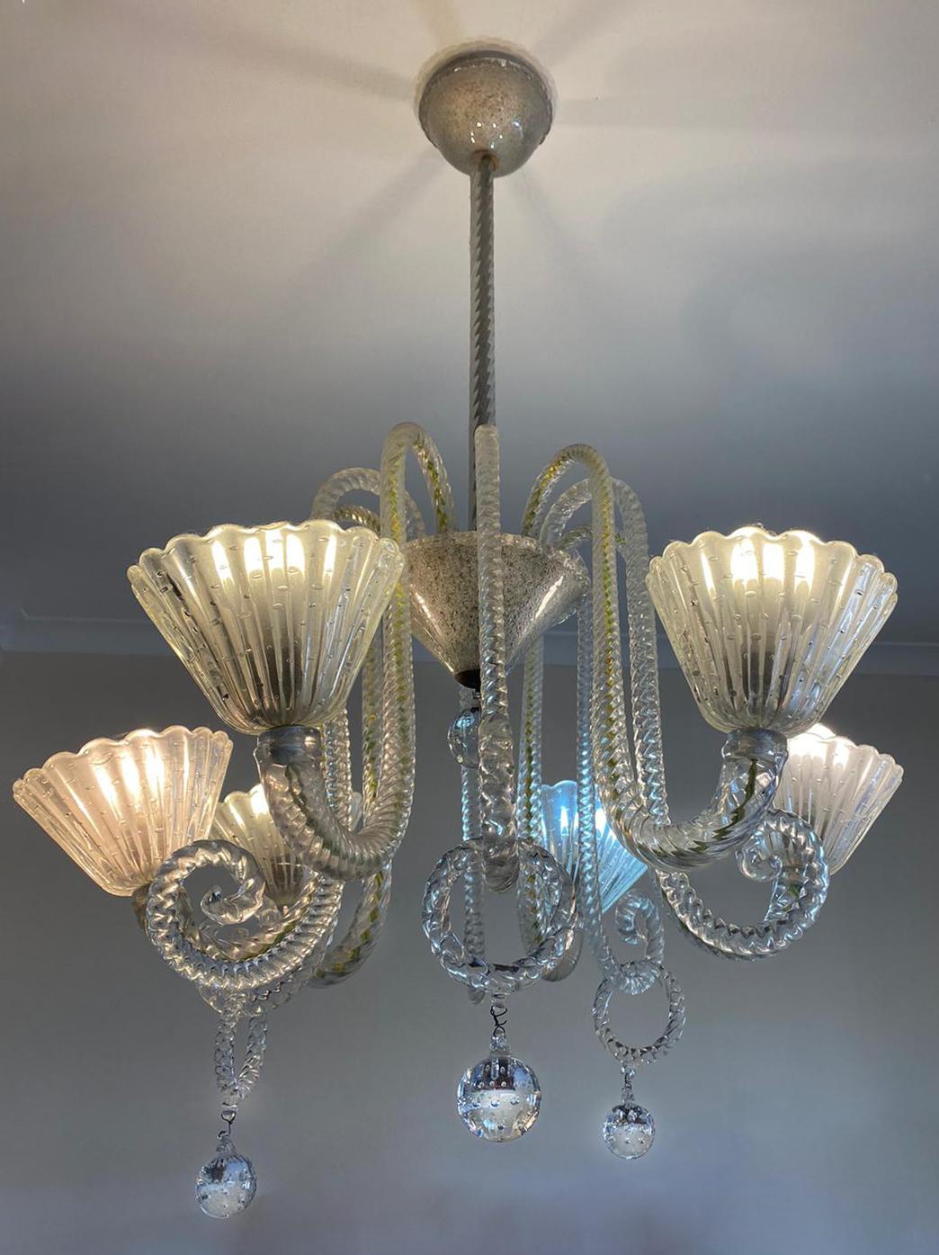 Elegant Murano chandelier by the famous Venetian master Ercole Barovier.
From the private collection of Baron Von Plant.
 