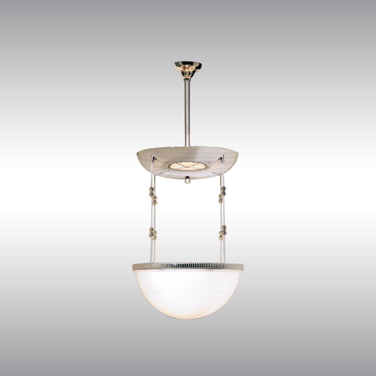 A chandelier which can illluminate a ceiling rosette from the bulbs inside the metal-part which is a mirror and reflect the light from the bulbs inside the glass-bowl. A smaller version with 35cm diameter (13.8