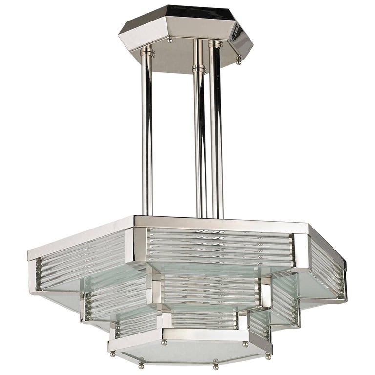 Art Deco chandelier with nickel finish and glass rods.