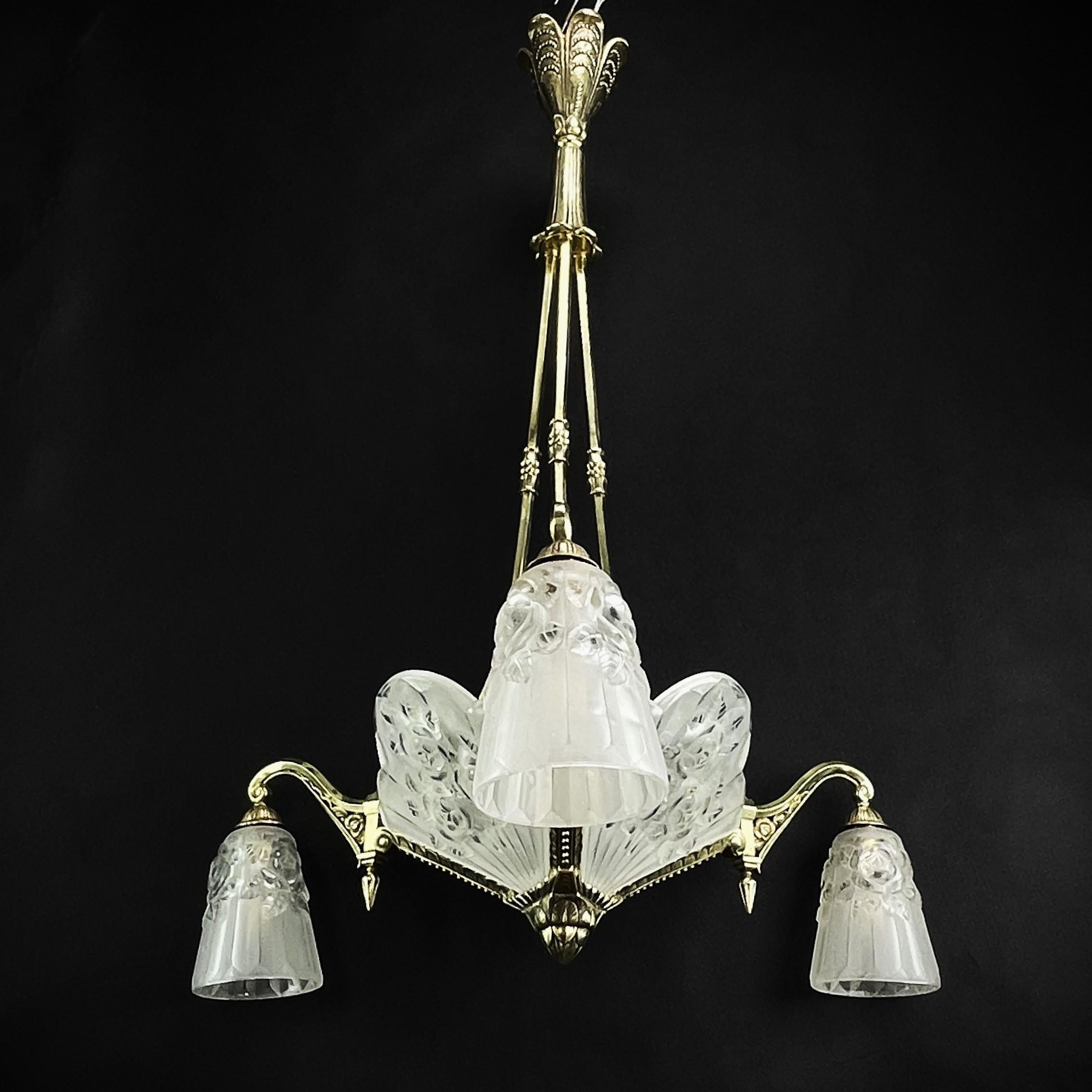 The ART DECO ceiling lamp is a remarkable example of early 20th century craftsmanship and style. 

The signature 