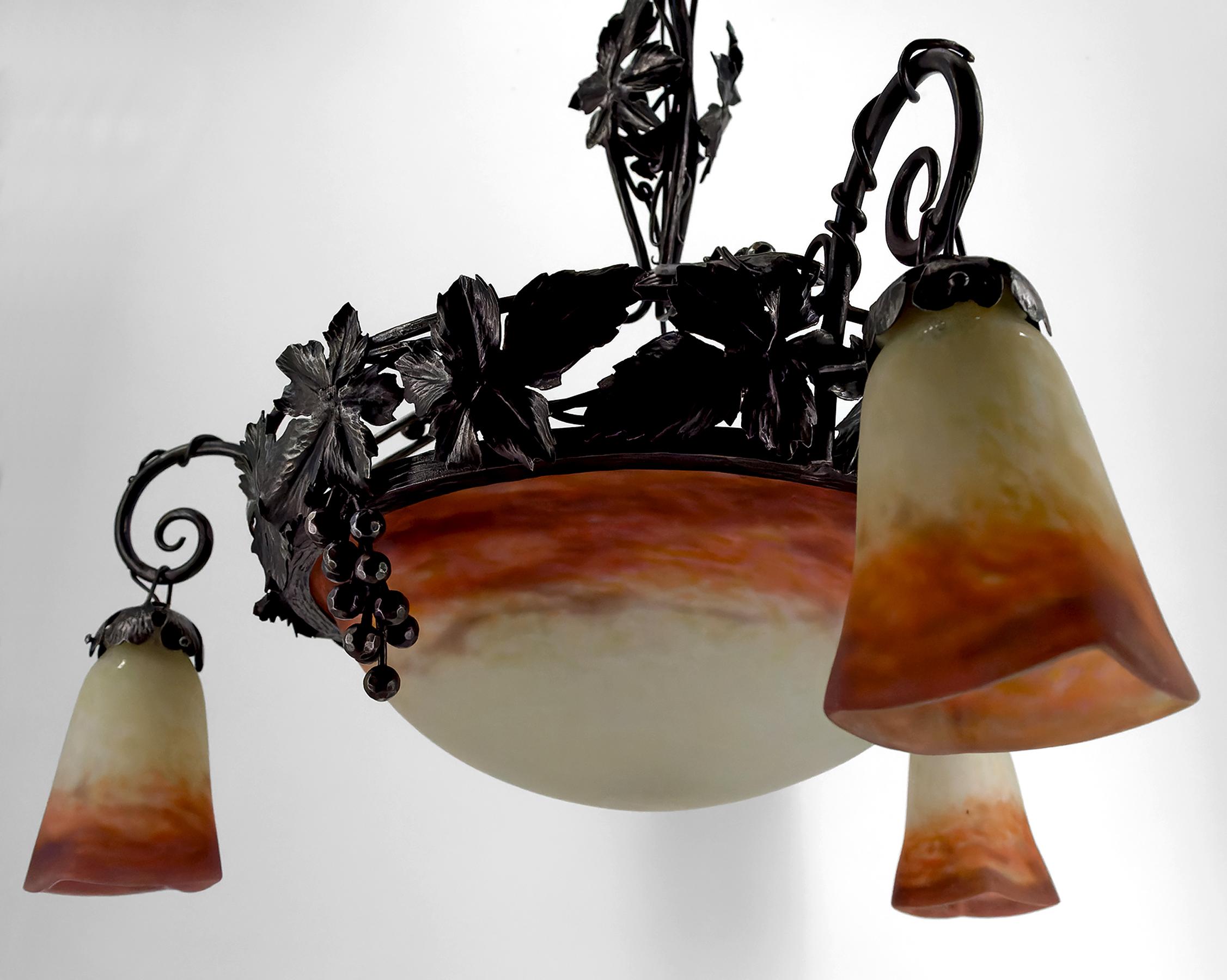 Carved Art Deco Chandelier in Wrought Iron and Blown Glass, Muller Frères, France, 1920 For Sale
