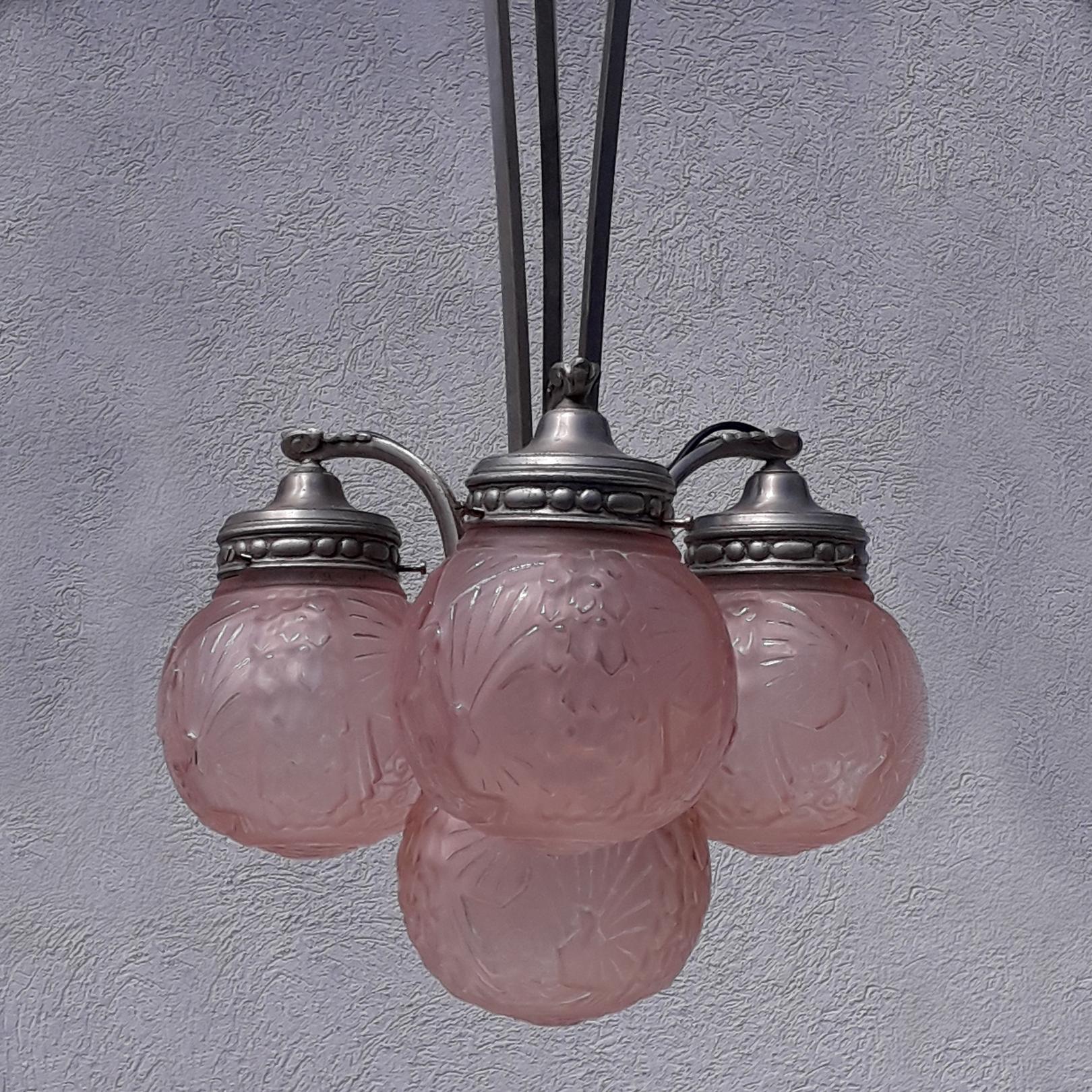 Muller Freres, Luneville chandelier, 1930s. Four pink glass globes, peacock and floral motif. Marked Muller Freres, Luneville on the collar and the globes.
