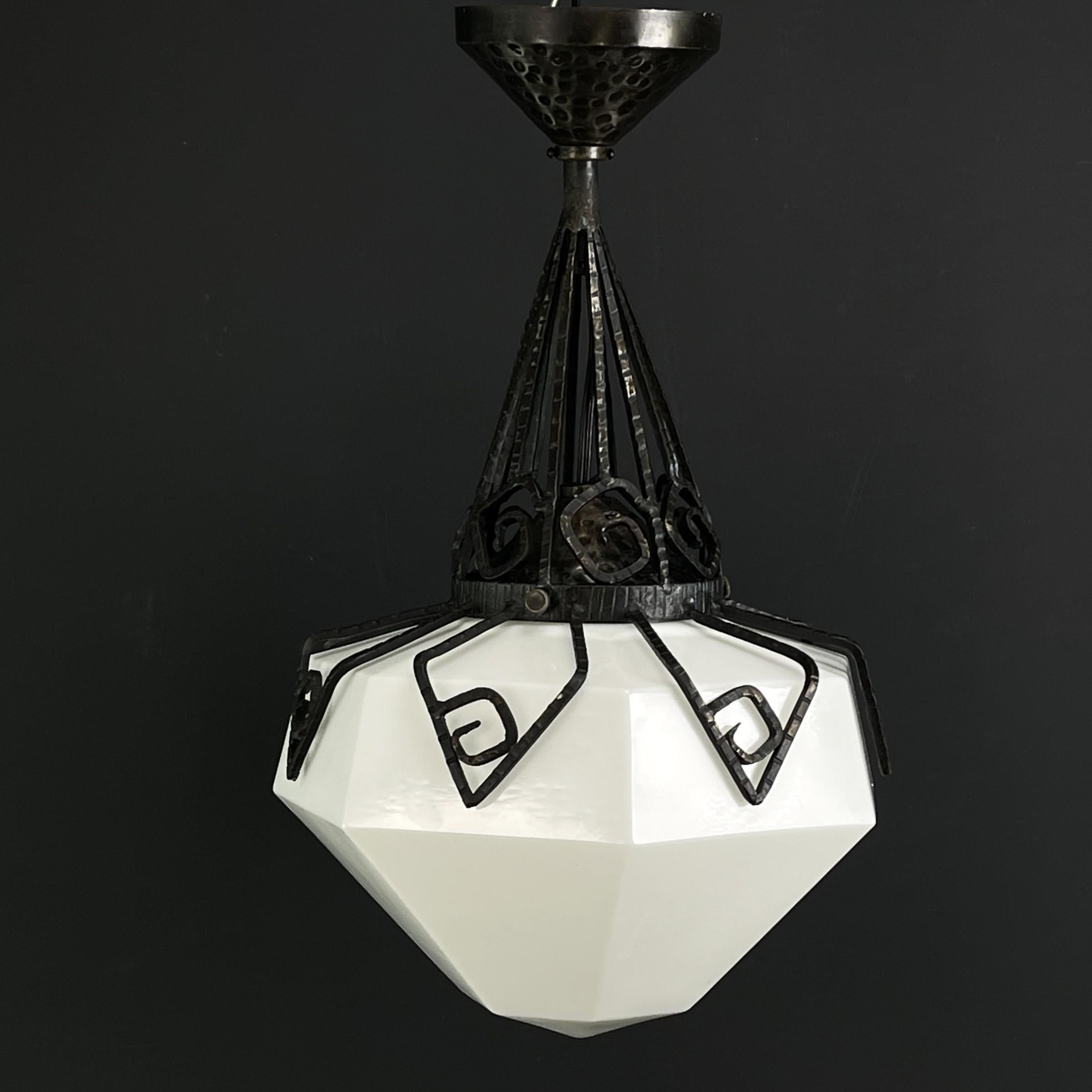 ART DECO chandelier opal glass wrought iron ceiling lamp 1930s

The ART DECO ceiling lamp is a remarkable example of the craftsmanship and style of the early 20th century. The ceiling lamp is a sign of outstanding craftsmanship and quality.

This