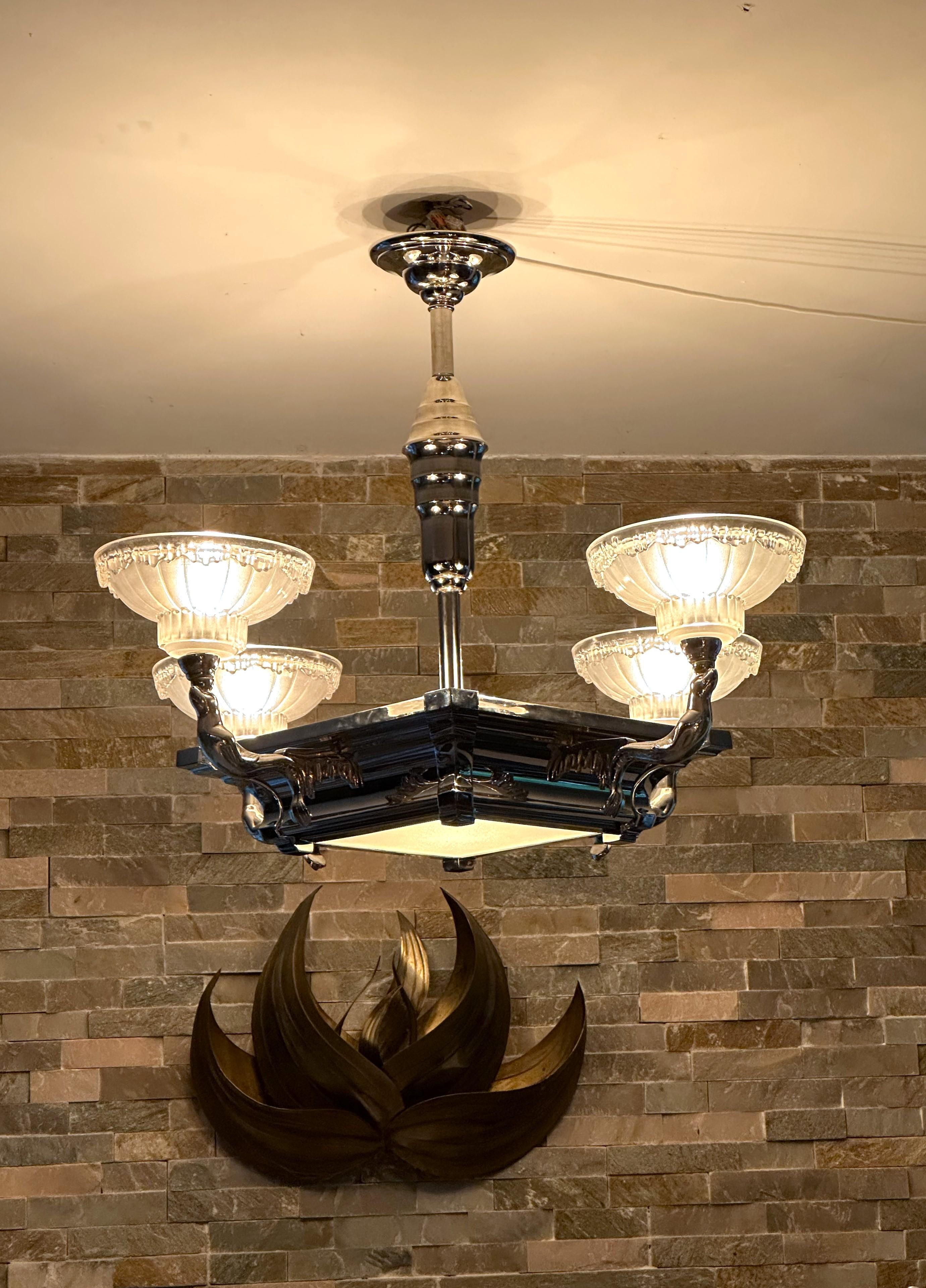 Art Deco Chandelier 
Model 'Seals'
Jean Boris Lacroix for Petitot
France 1935

original LA+ signed oplescent shades/coupelles.
new nickel platetd.
rewired.
220/240 Volt, 6 sockets b22
