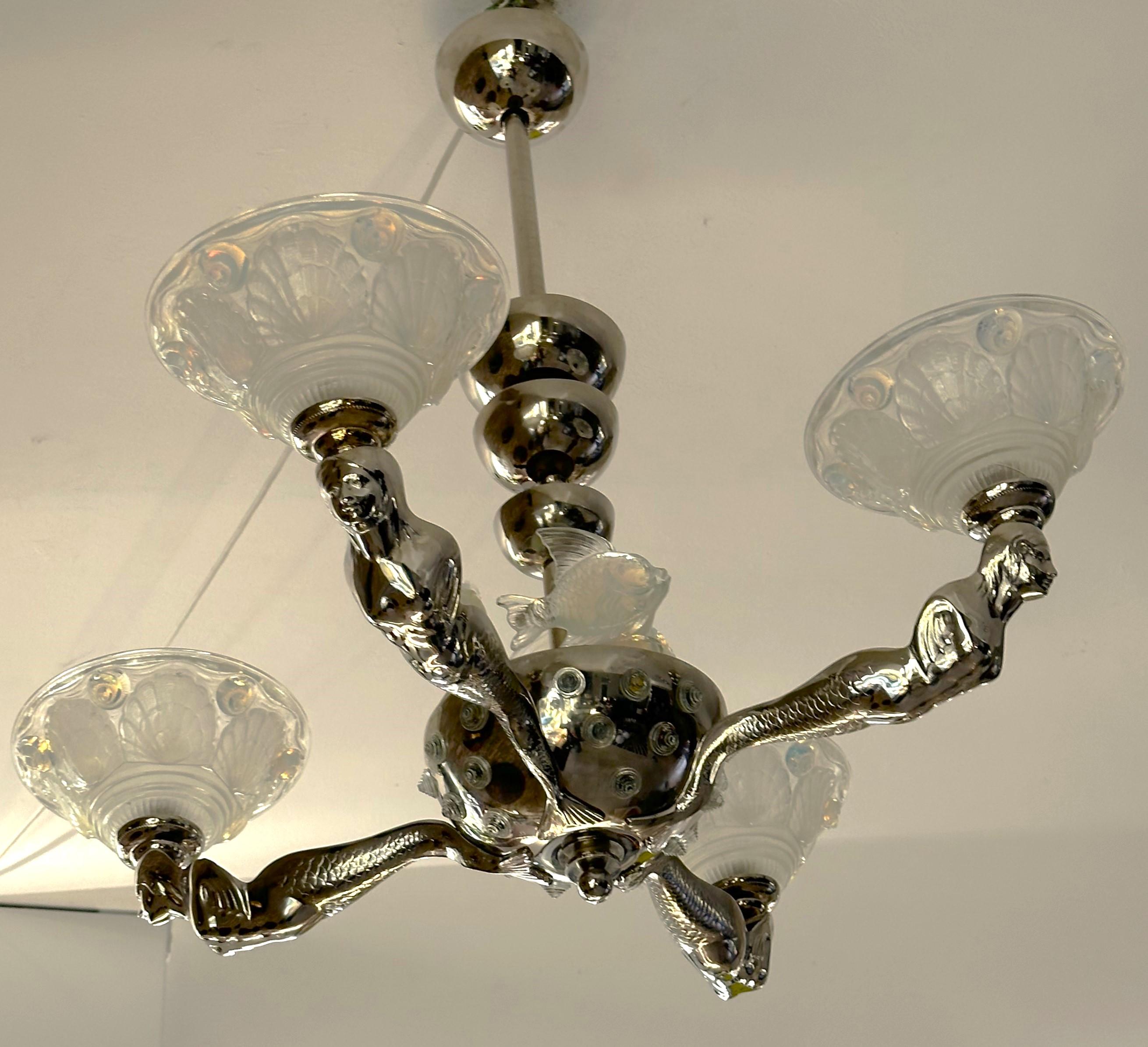 Art Deco Chandelier 

Opaline Glass shades signed LA+ = Boris Lacroix
Model Mermaids
France 1938

new nickel plated. rewired.
6  b22 bulbs