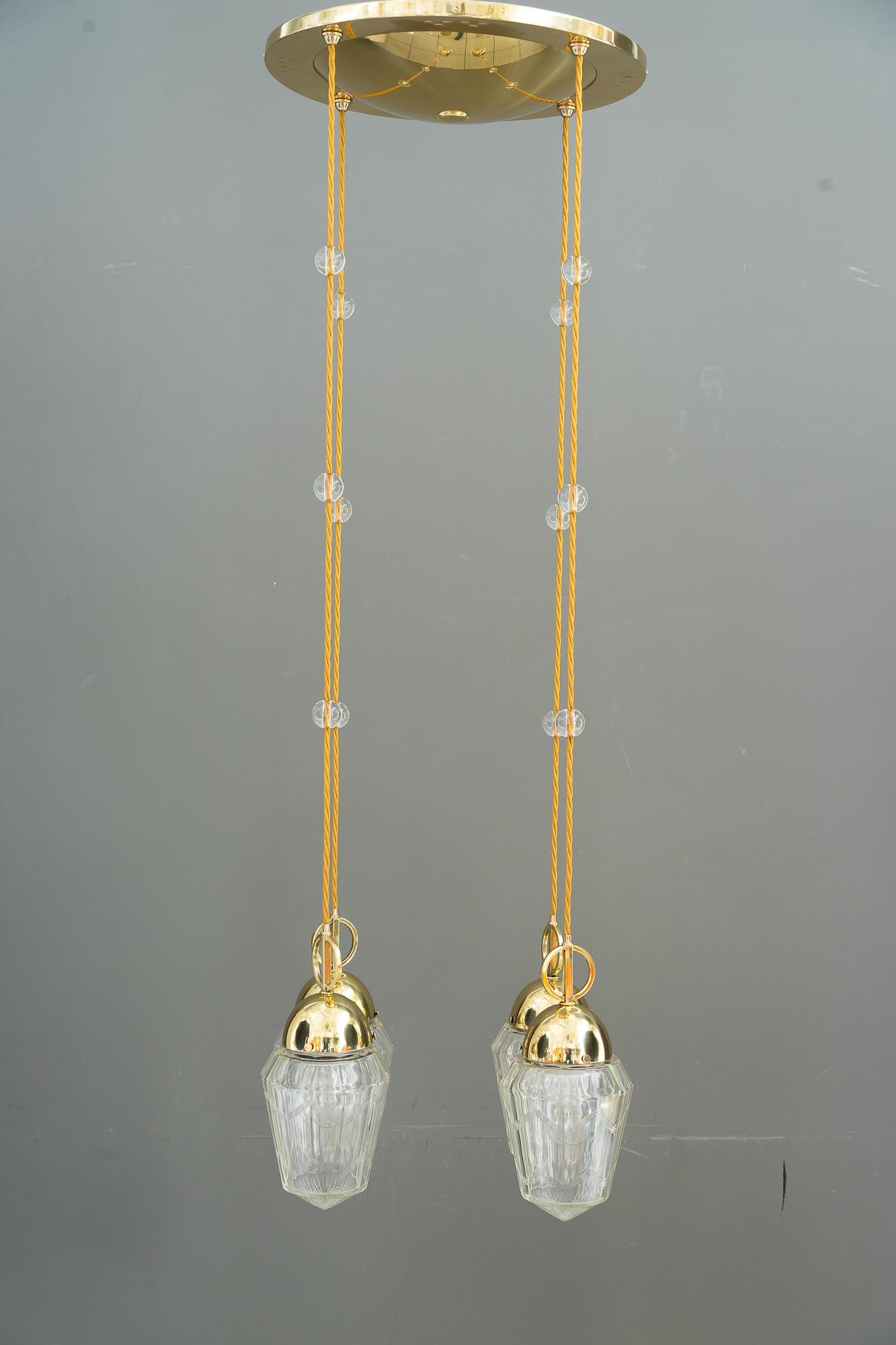 Art Deco chandelier vienna around 1920s
Polished and stove enameled
Original cut glass shades
We can adjust the height of the chandelier to your room height
The wires are replaced ( new )
The glass balls on the wire are replaced ( new ).

