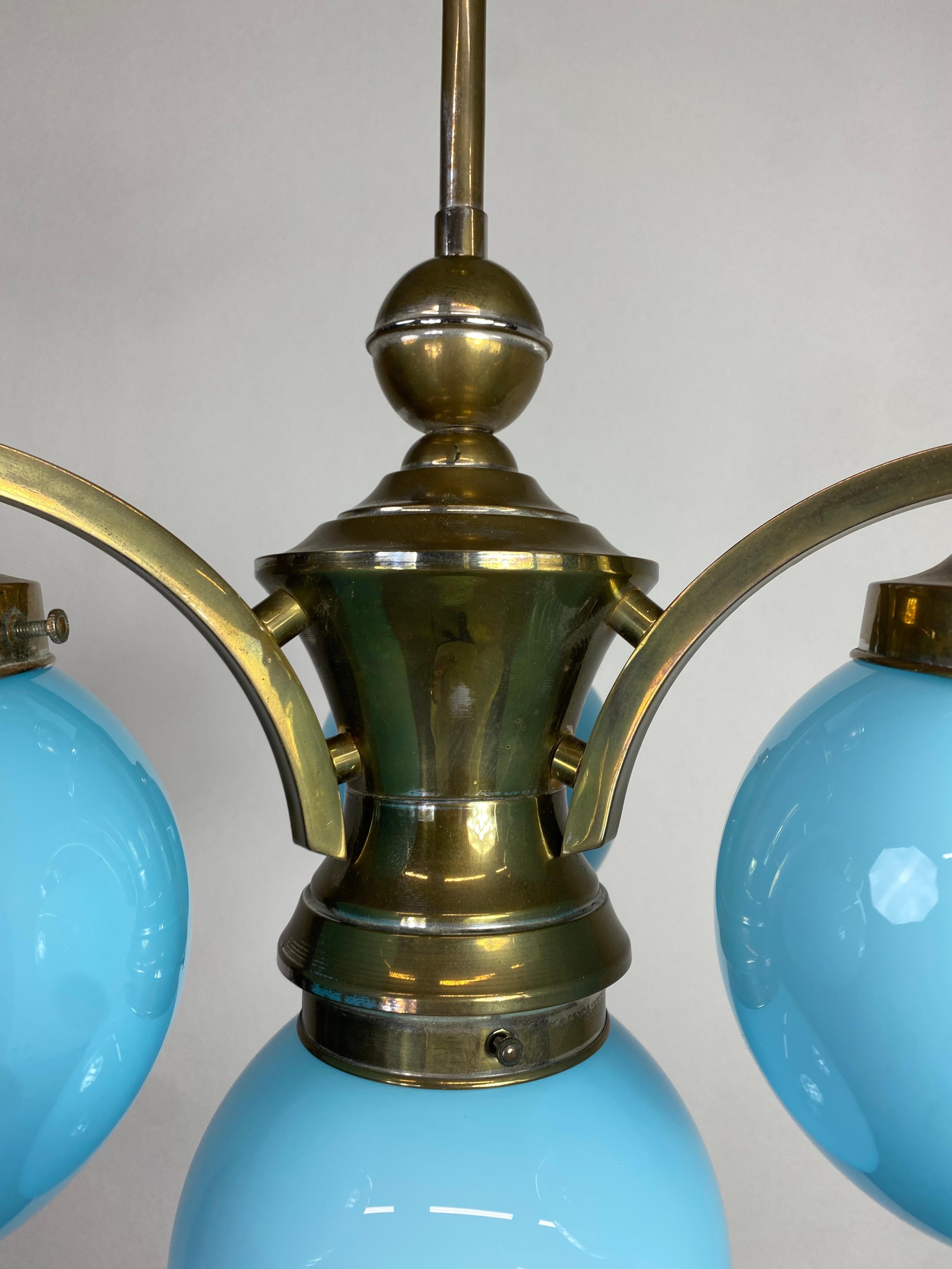 Brass Art deco chandelier with blue lampshades For Sale